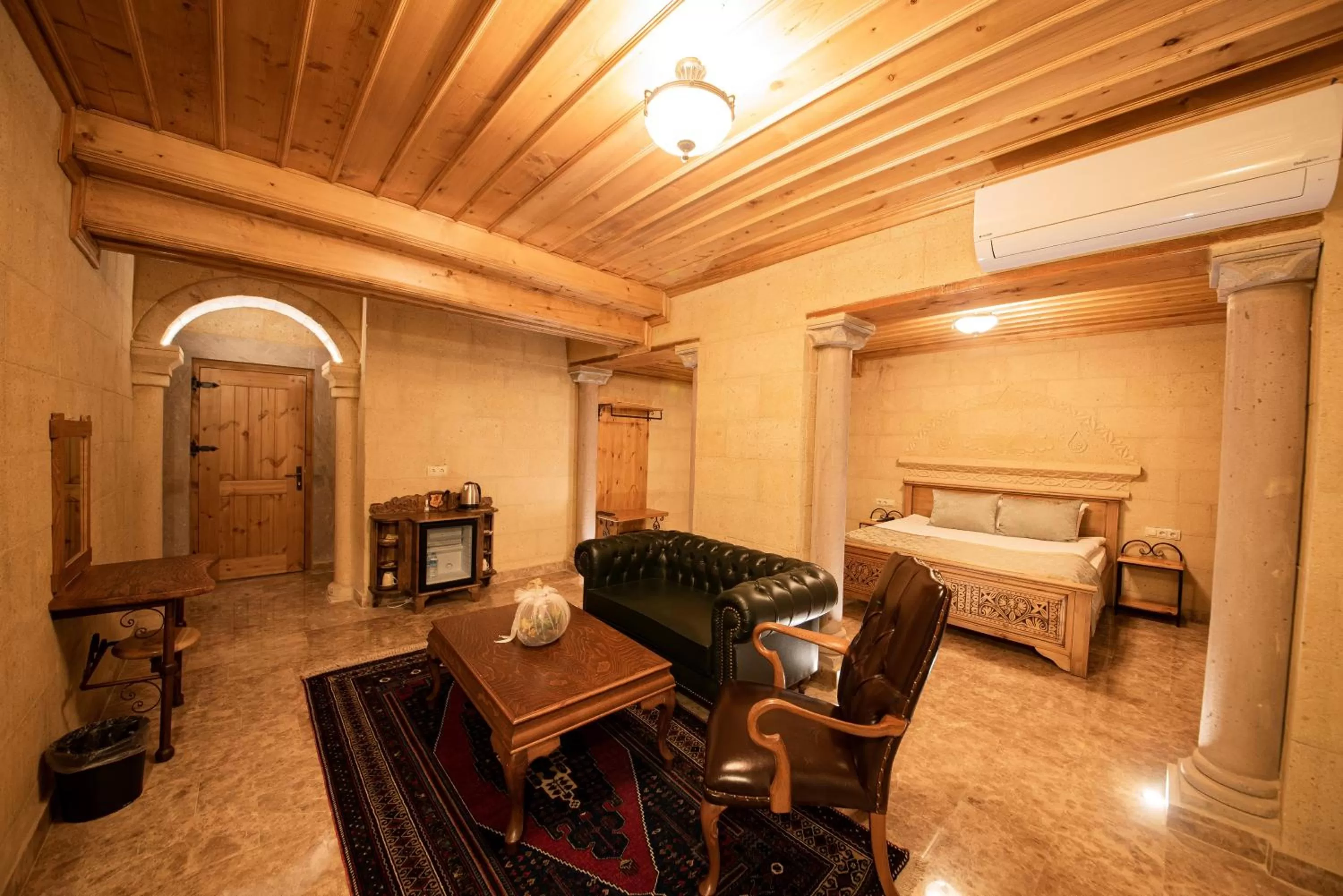 Seating area, Bed in Cratus Stone Palace