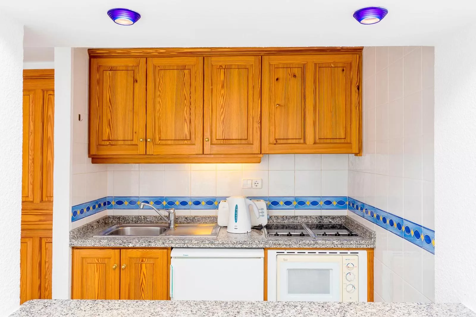 Kitchen or kitchenette in Aparthotel Duquesa Playa