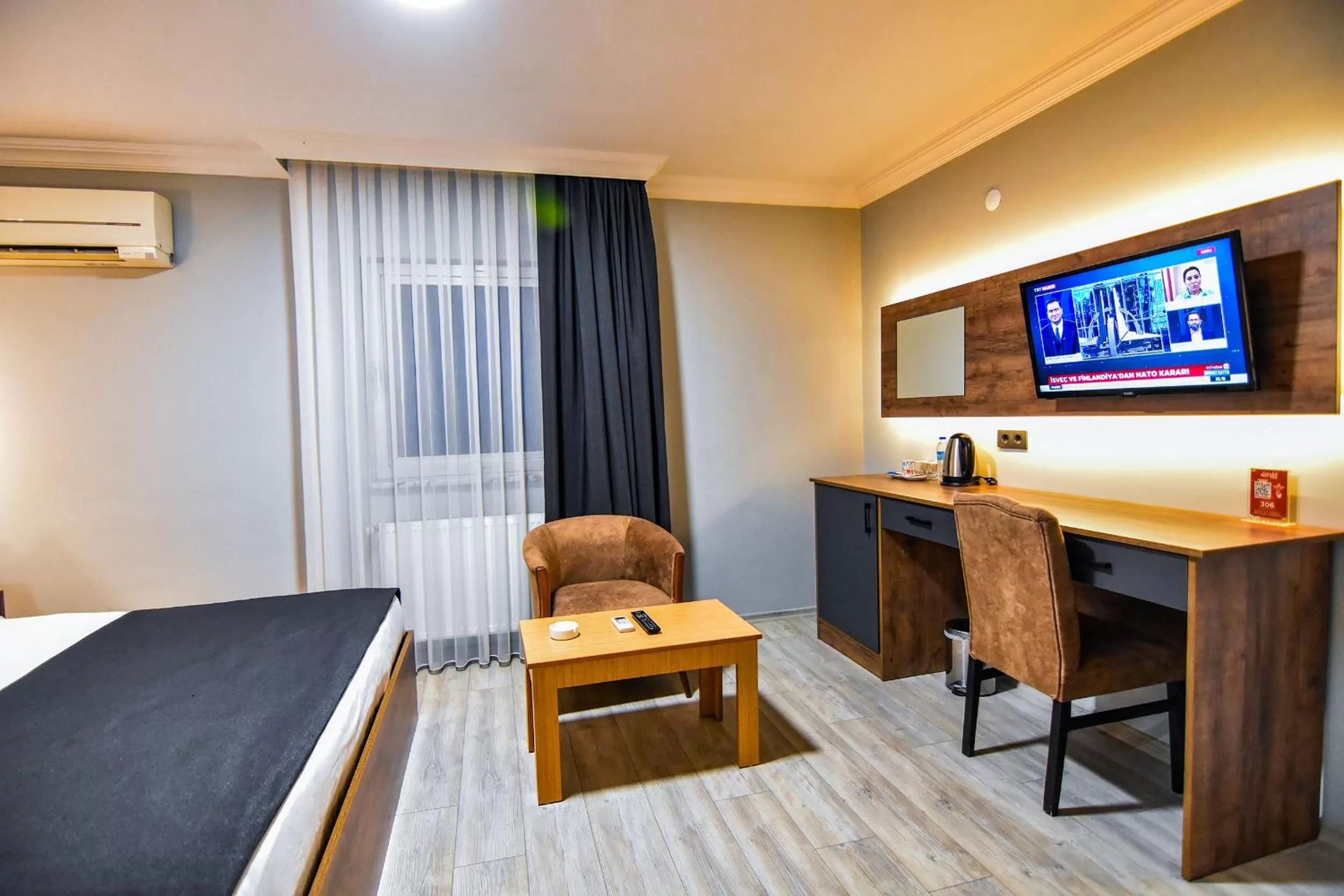 TV and multimedia, TV/Entertainment Center in Sandal Otel