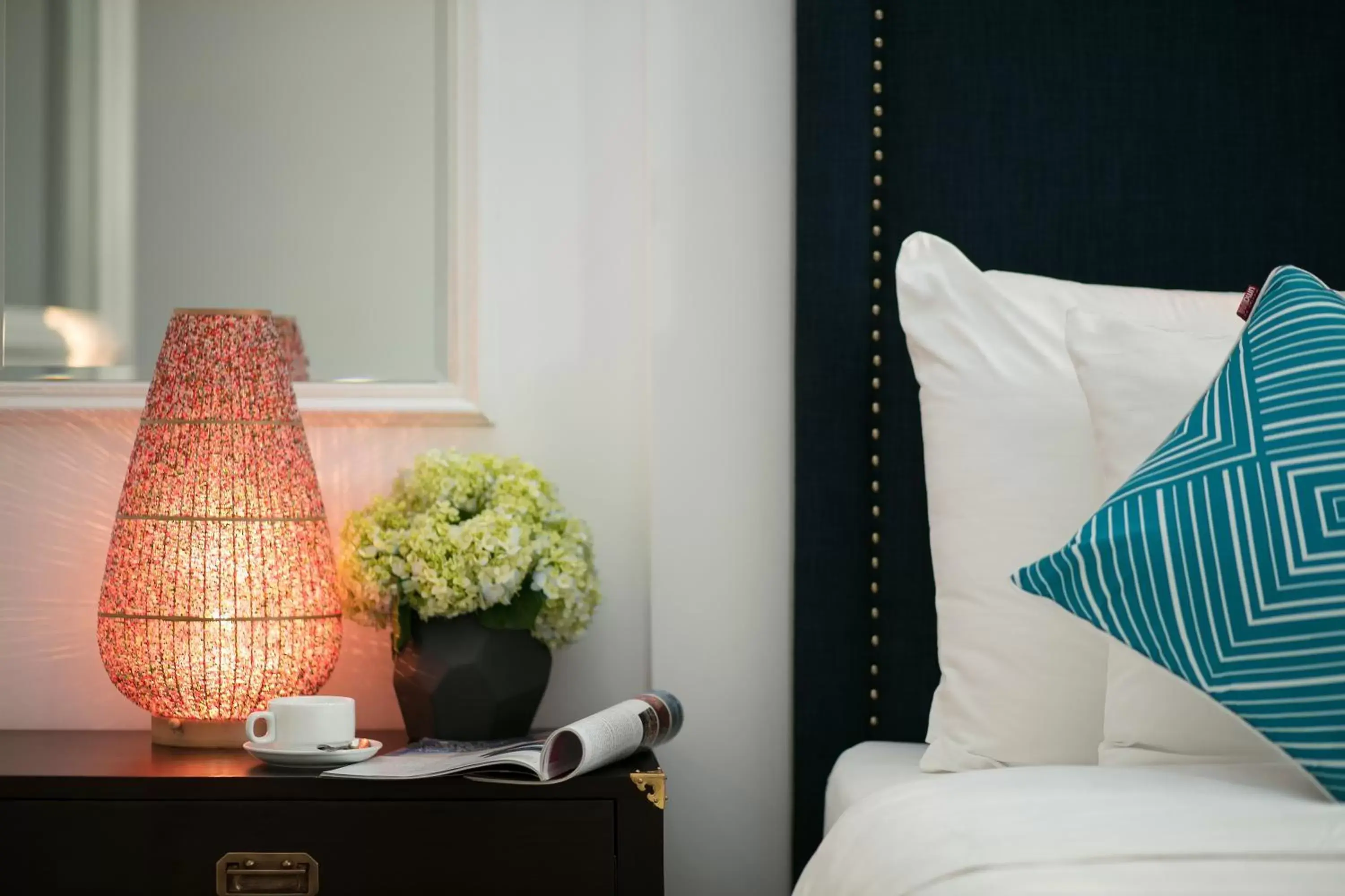 Decorative detail, Bed in Golden Rooster Hotel