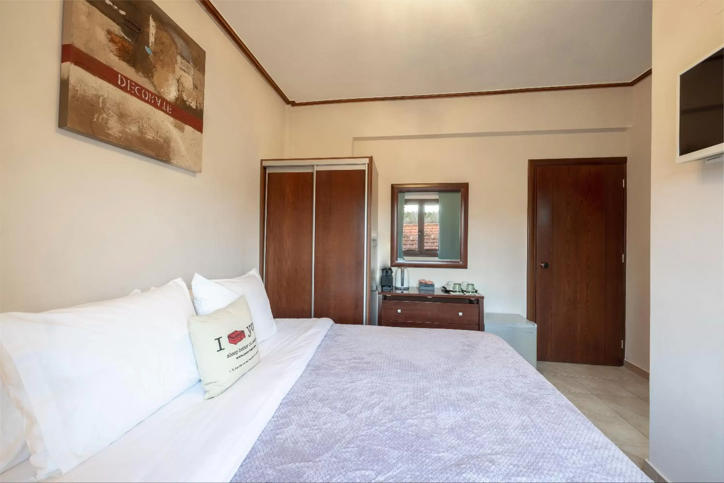 Bed in Tsikeli Boutique Hotel Meteora - Adults Friendly