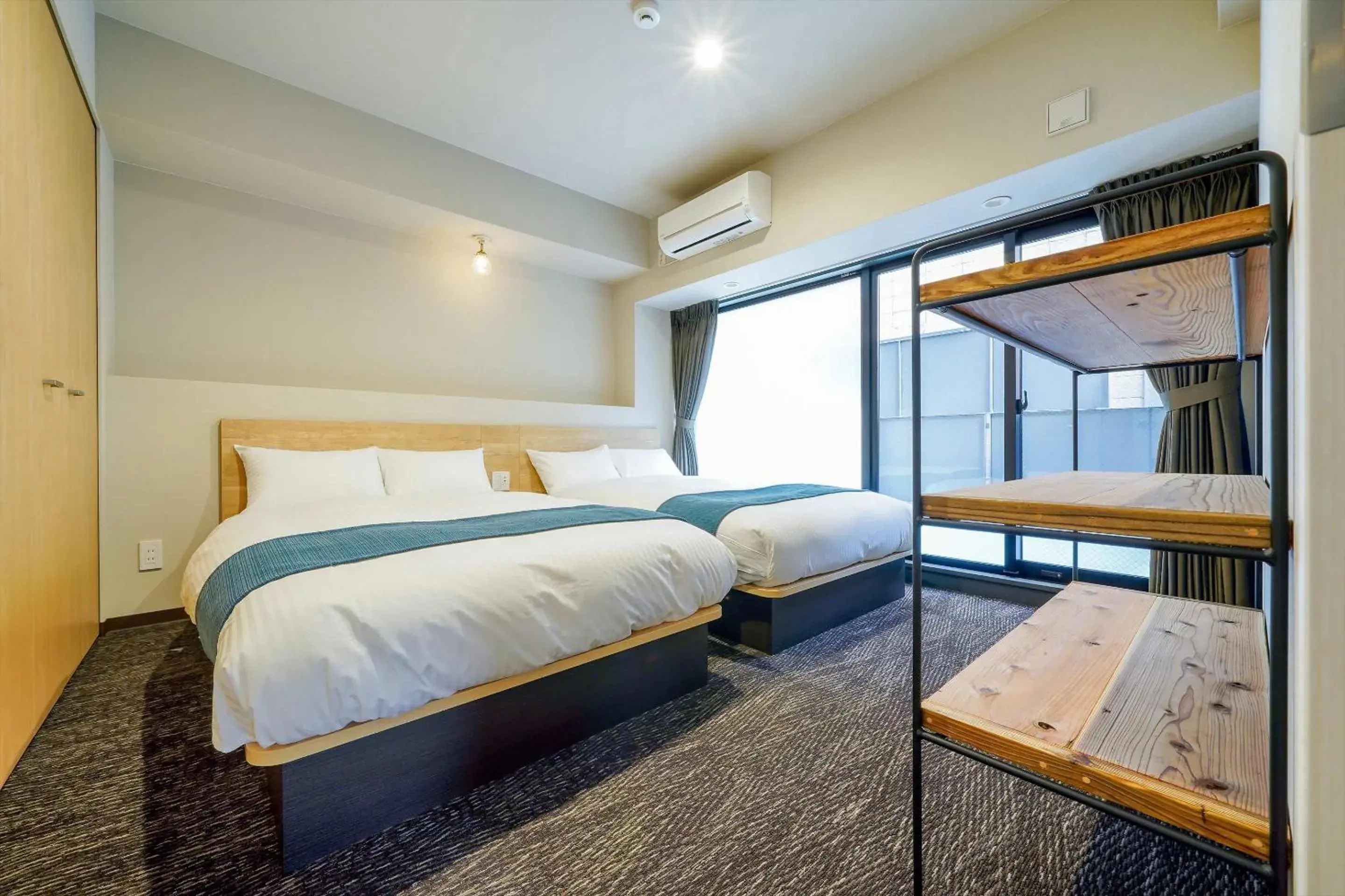 Bed in RESI STAY cotorune KYOTO