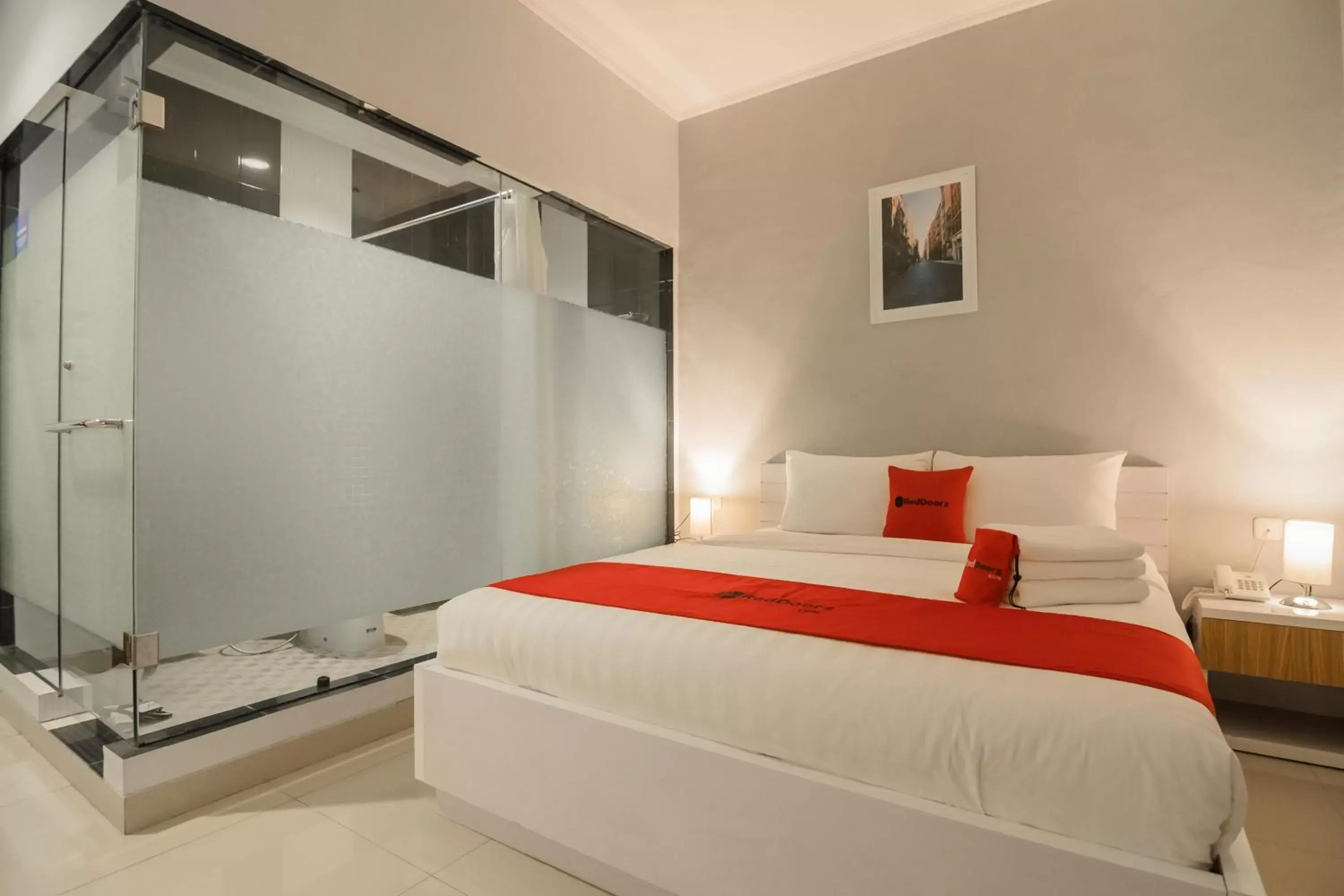 Photo of the whole room, Bed in RedDoorz Plus near Soekarno Hatta Airport 2