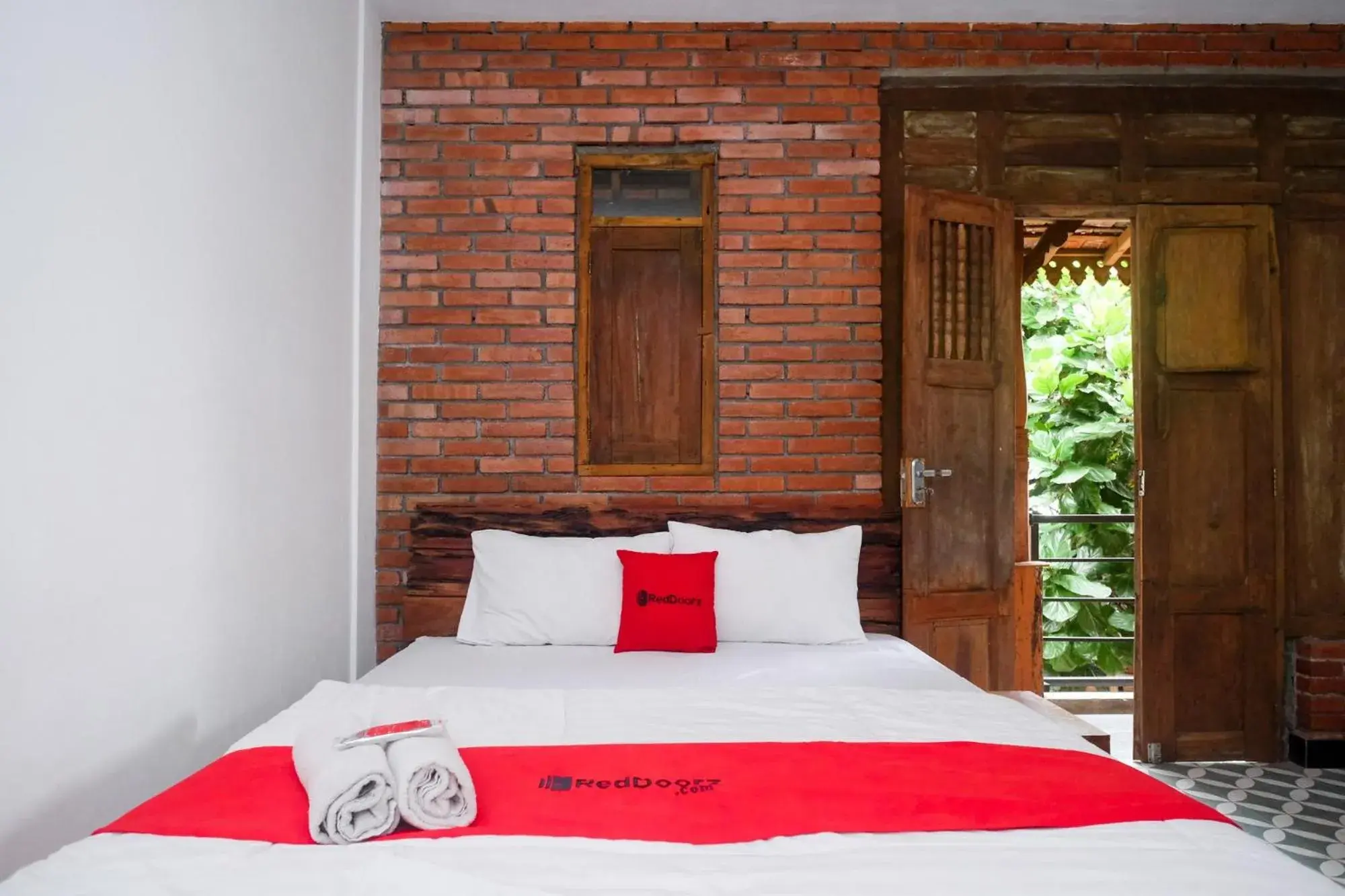 Bed in RedDoorz Syariah near Akmil Magelang