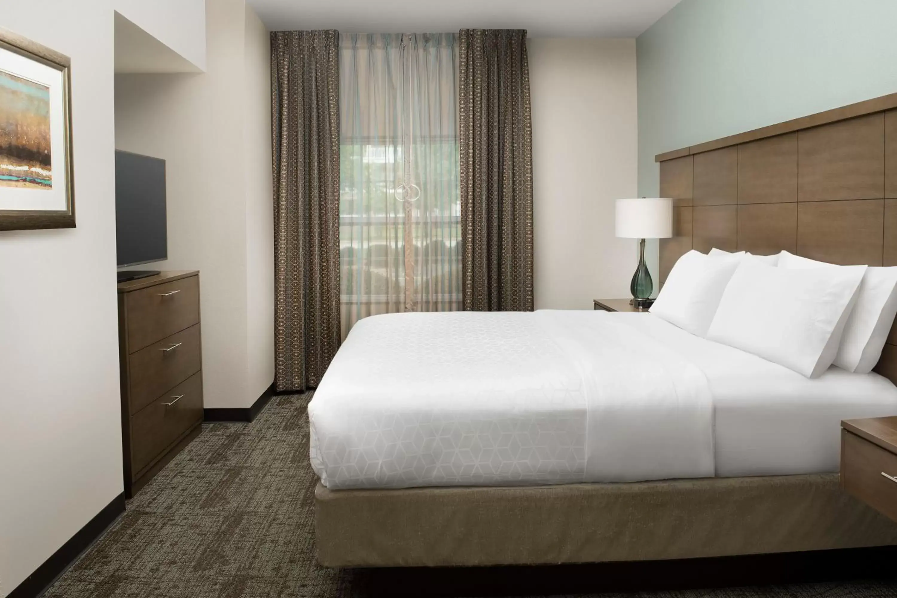 TV and multimedia, Bed in Staybridge Suites Greenville I-85 Woodruff Road, an IHG Hotel