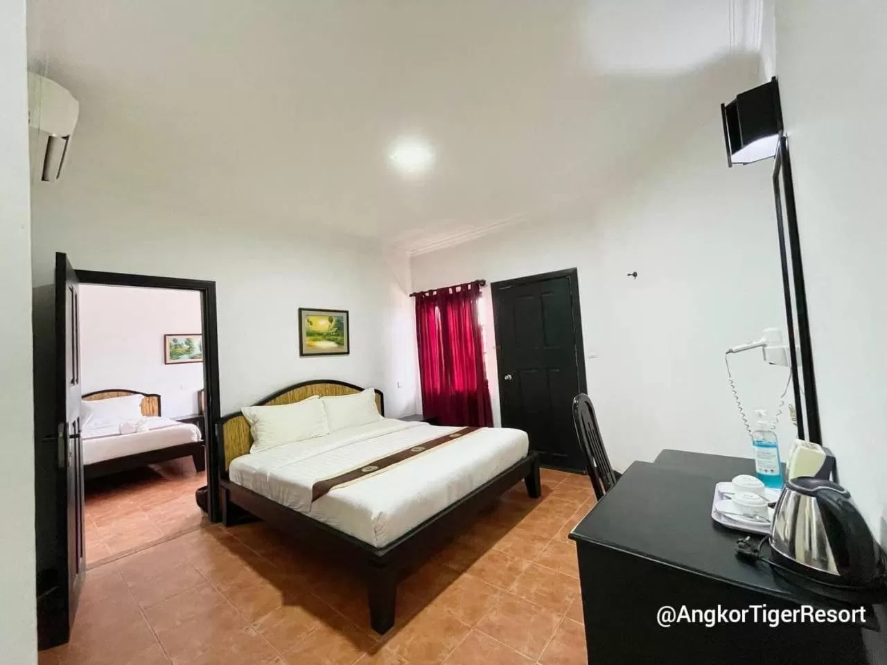 Photo of the whole room, Bed in Angkor Tiger Resort