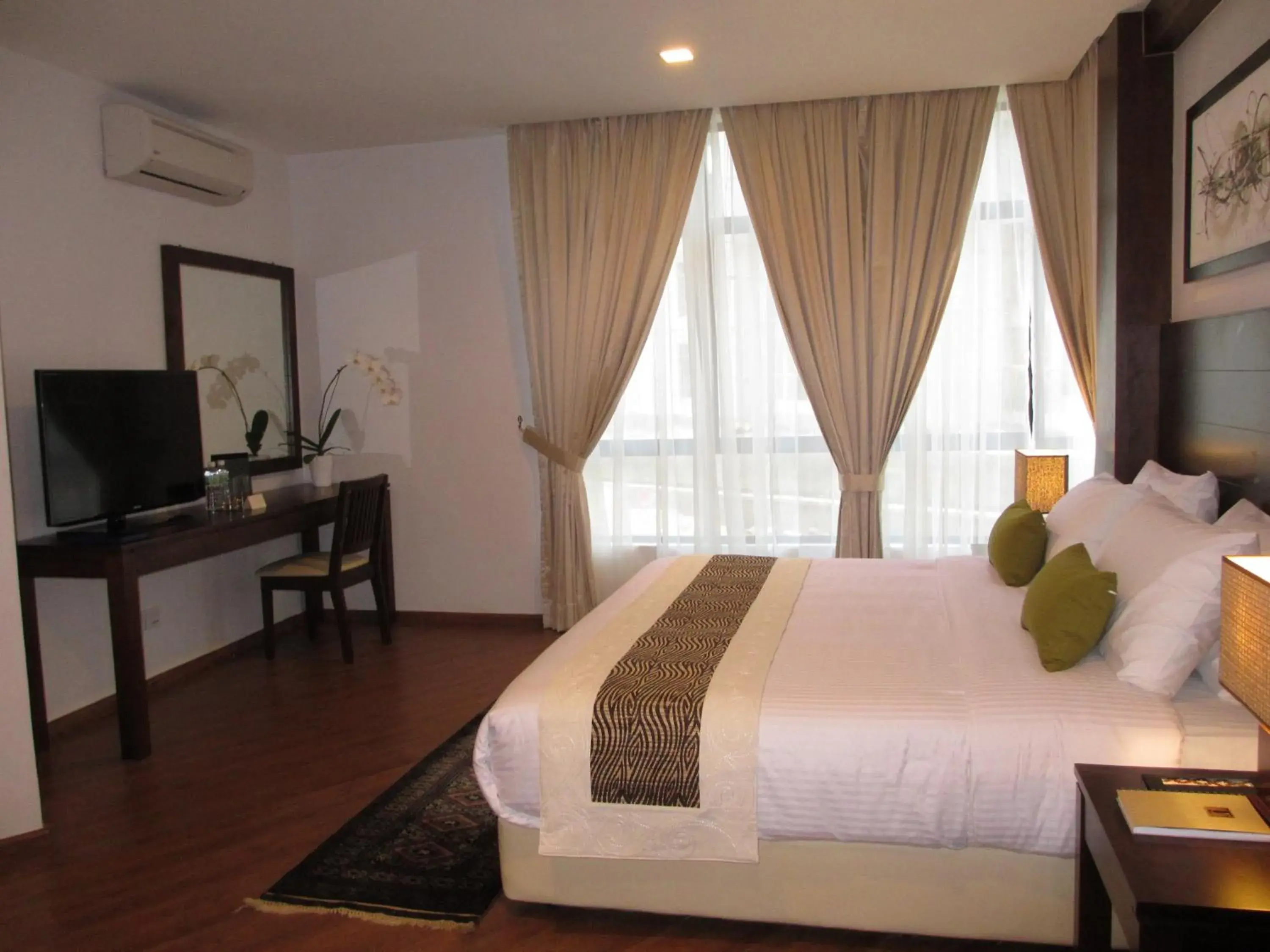 Bed in Samsuria Beach Resort & Residence