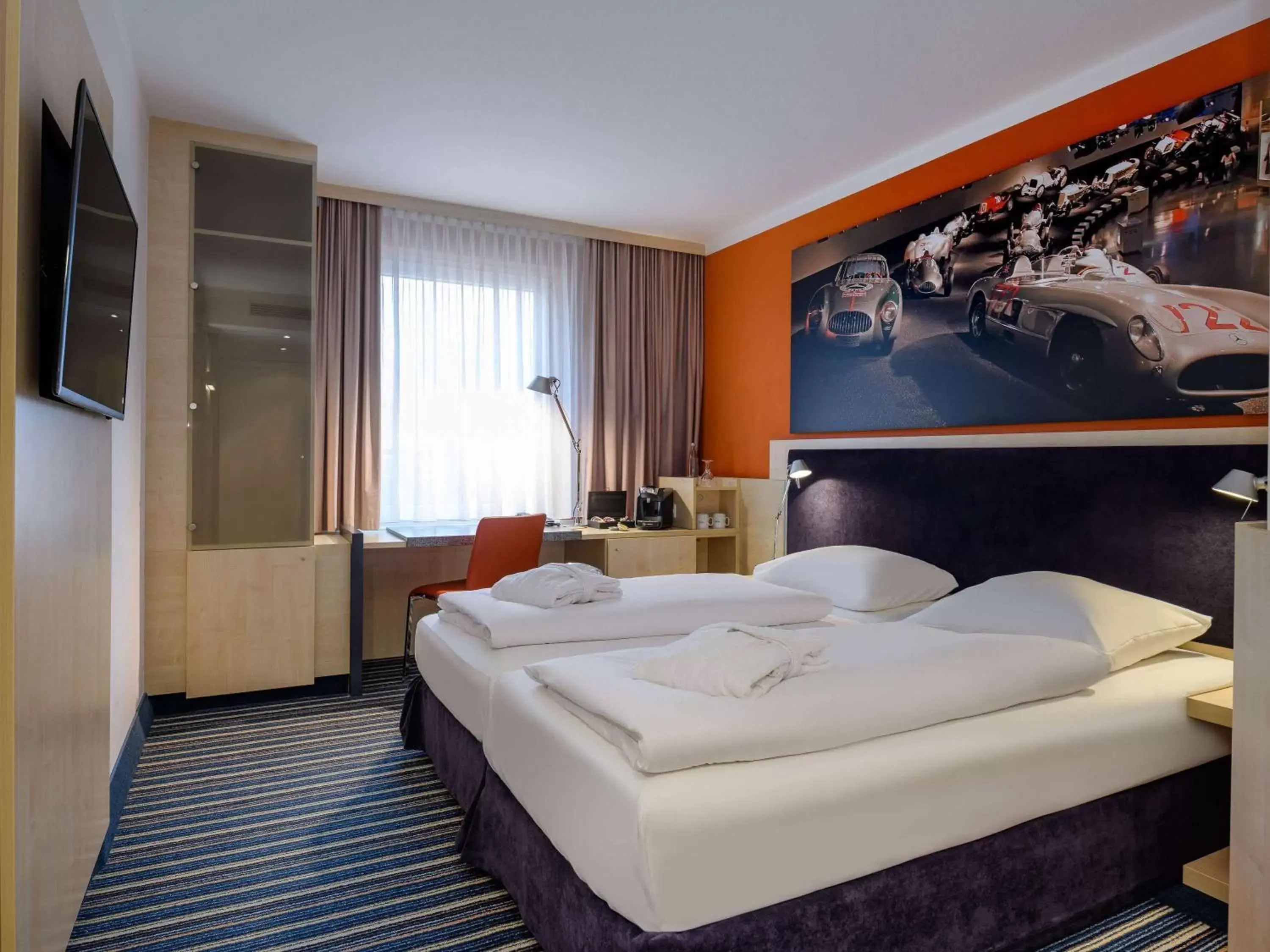 Photo of the whole room, Bed in Mercure Hotel Stuttgart City Center