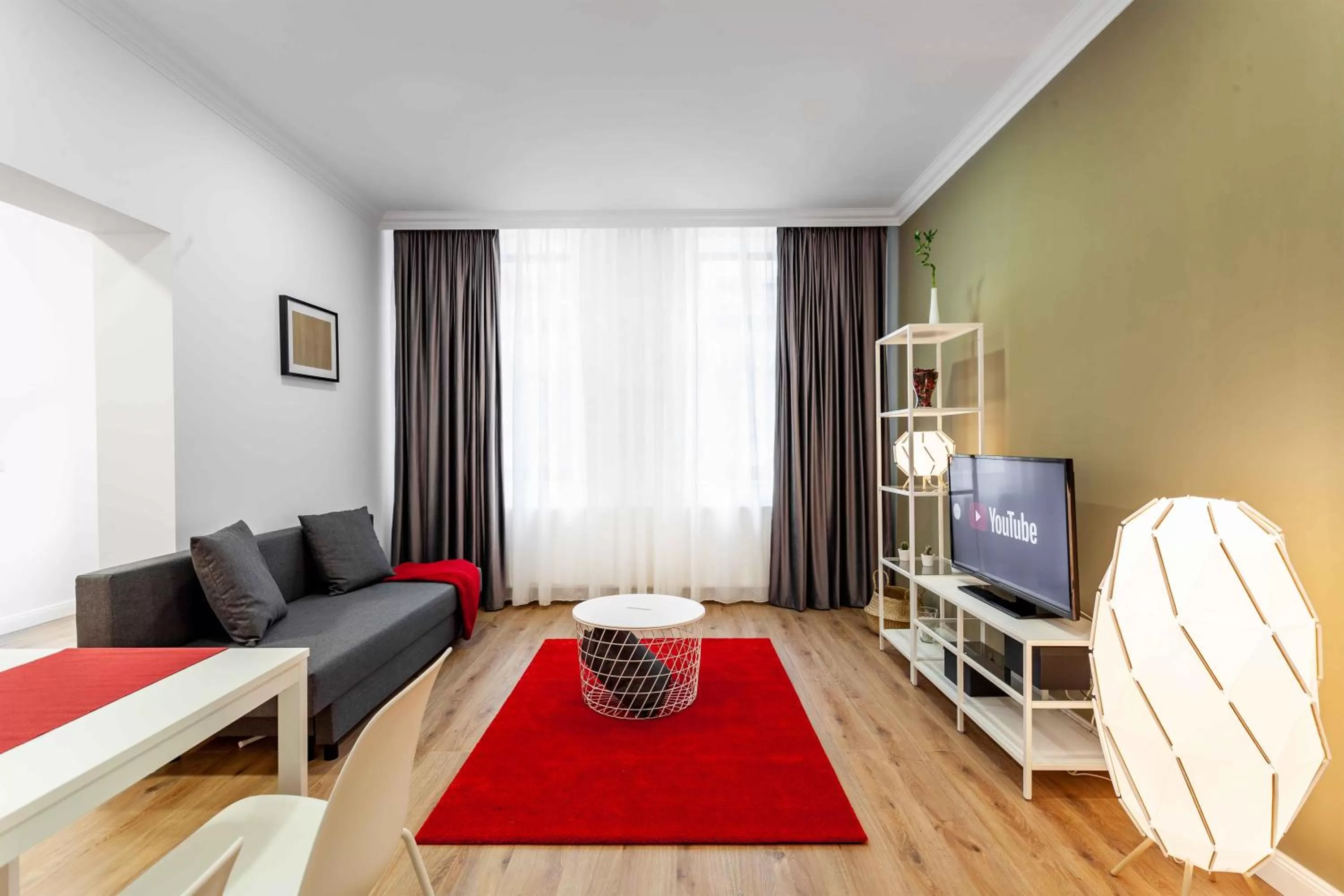 Communal lounge/ TV room in Martin Boutique Hotel