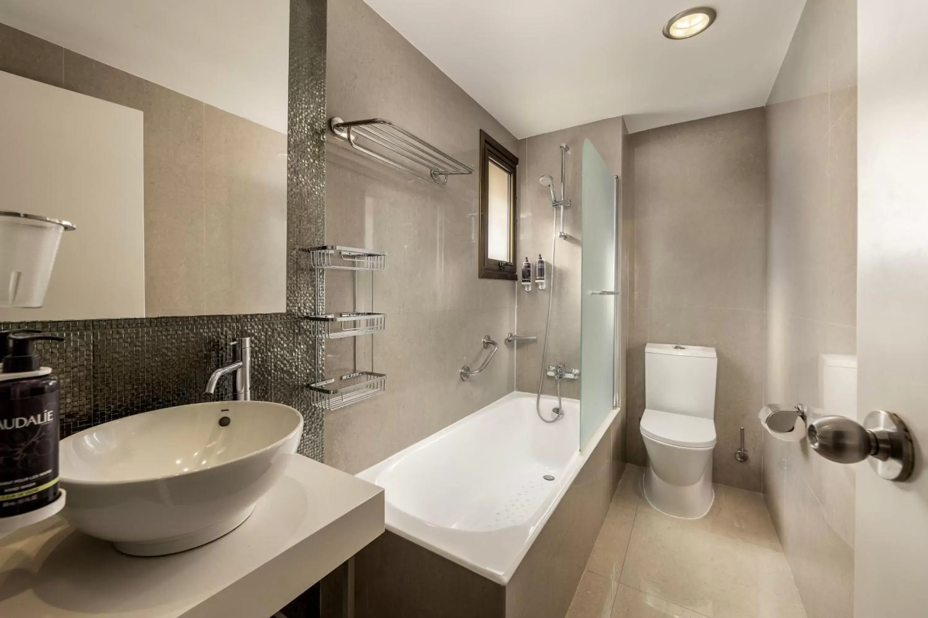 Bathroom in The King Jason Paphos - Designed for Adults by Louis Hotels