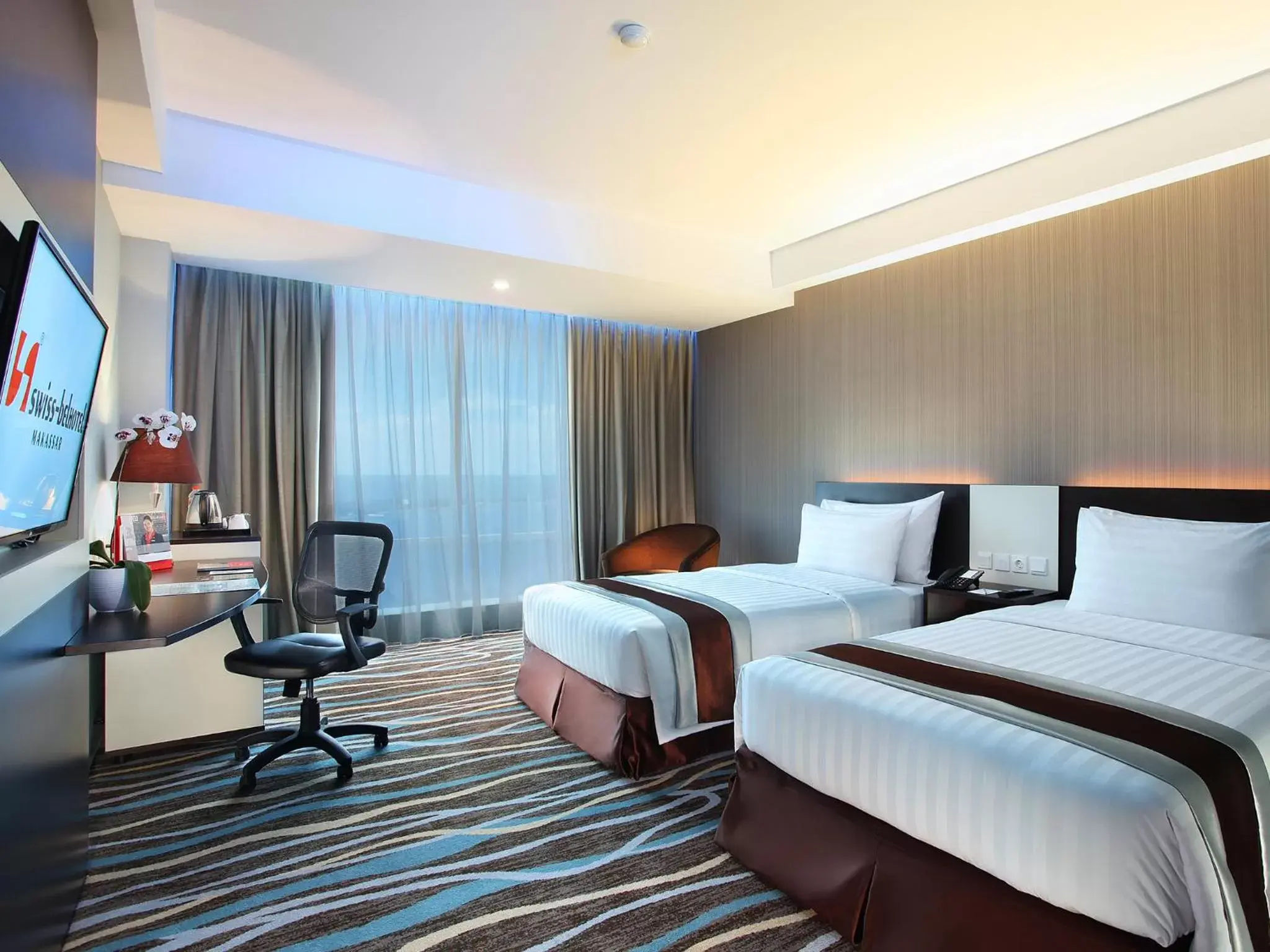 TV and multimedia, Bed in Swiss-Belhotel Makassar