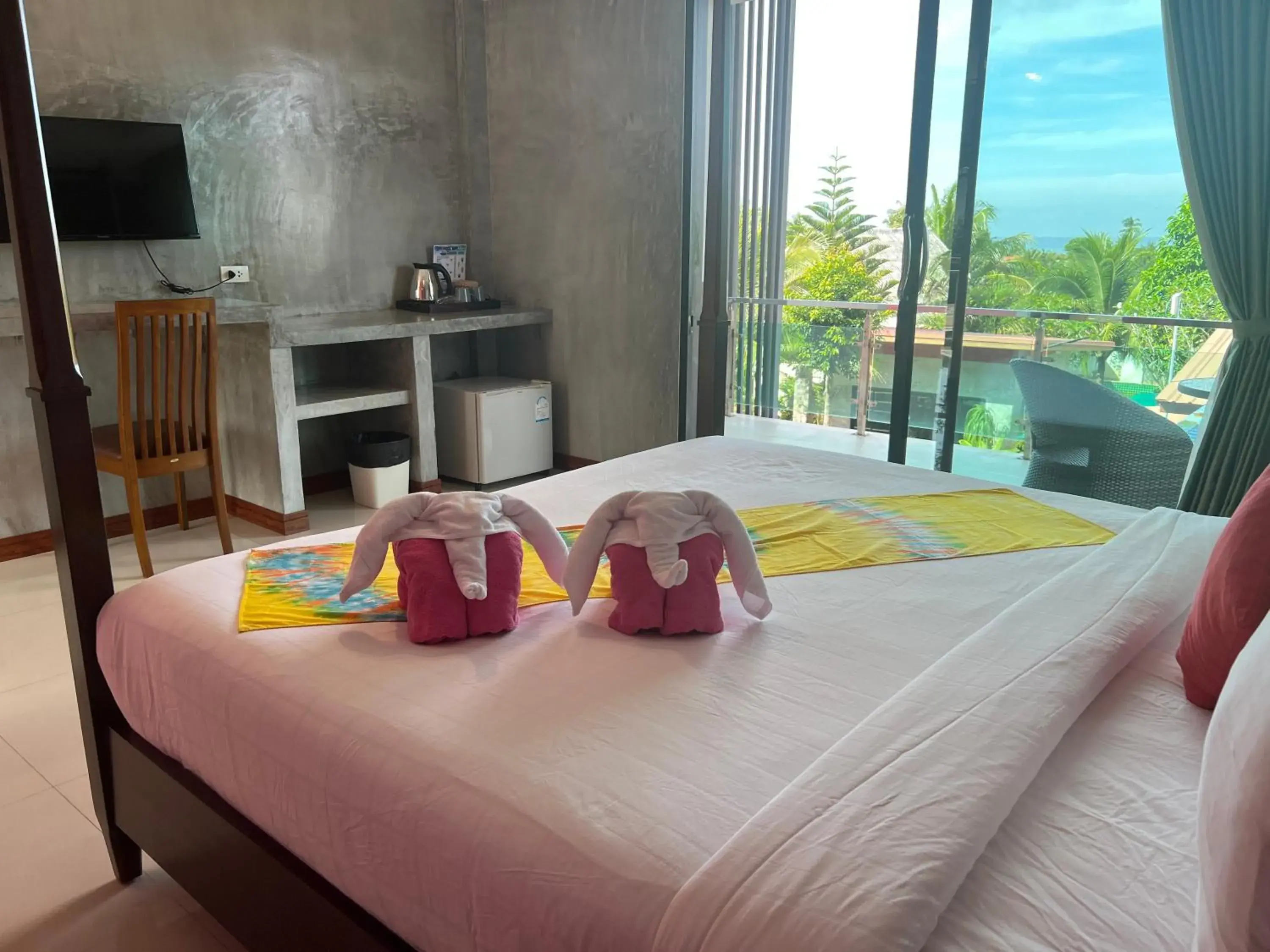 Bed in Pinky Bungalow Resort - SHA Extra Plus