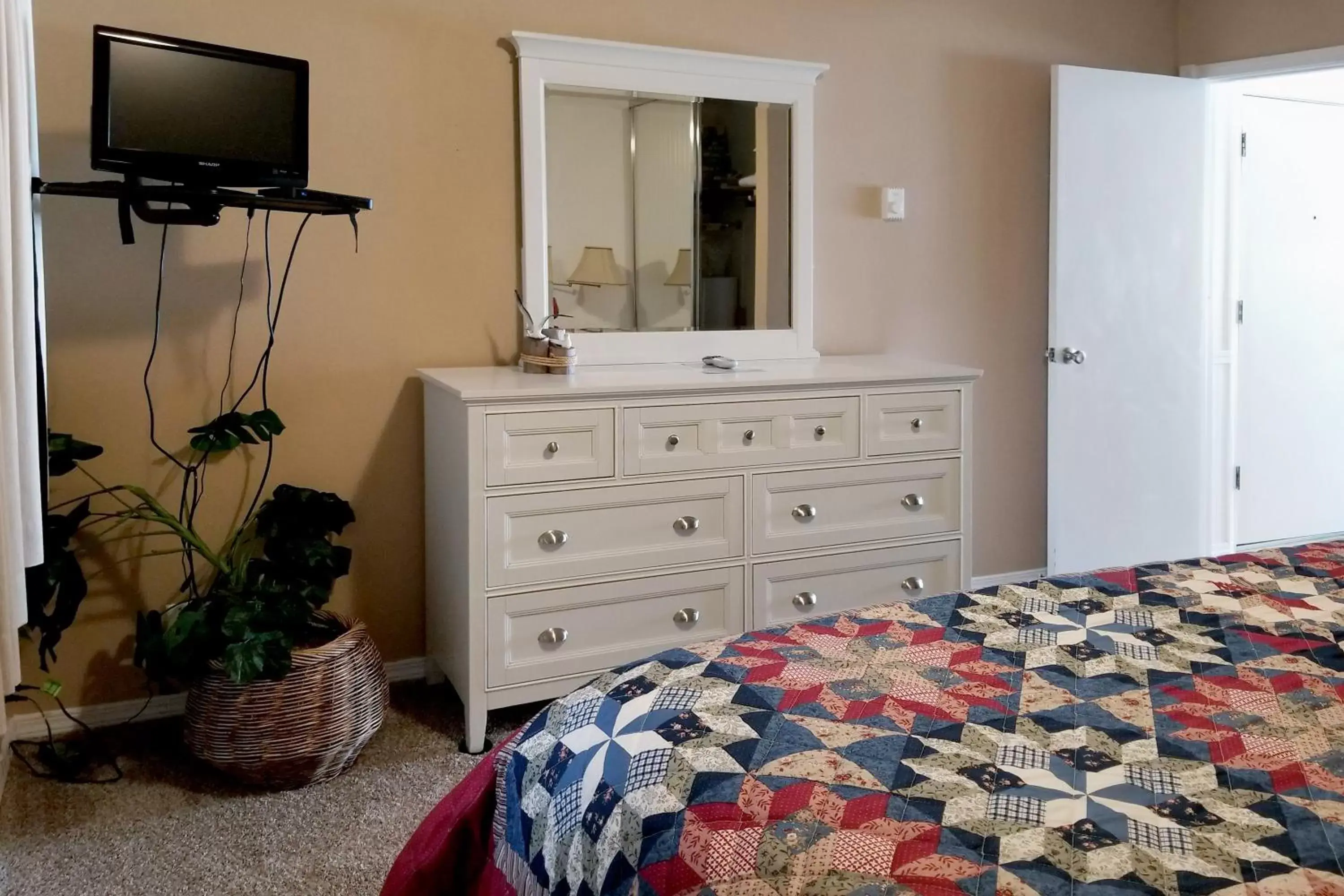 Bedroom, TV/Entertainment Center in Ocean Terrace Condominiums