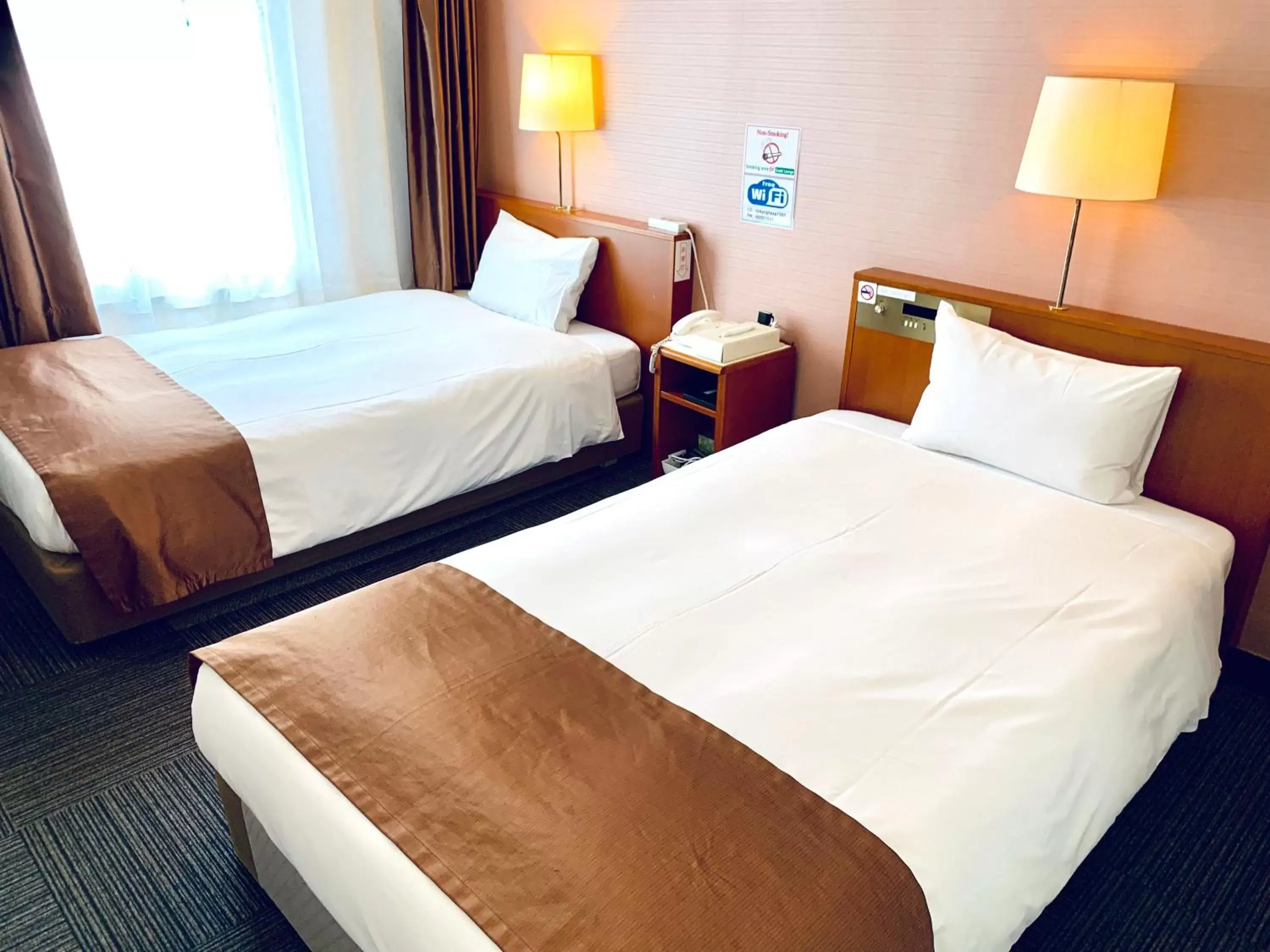 Bed in Tokyo Plaza Hotel