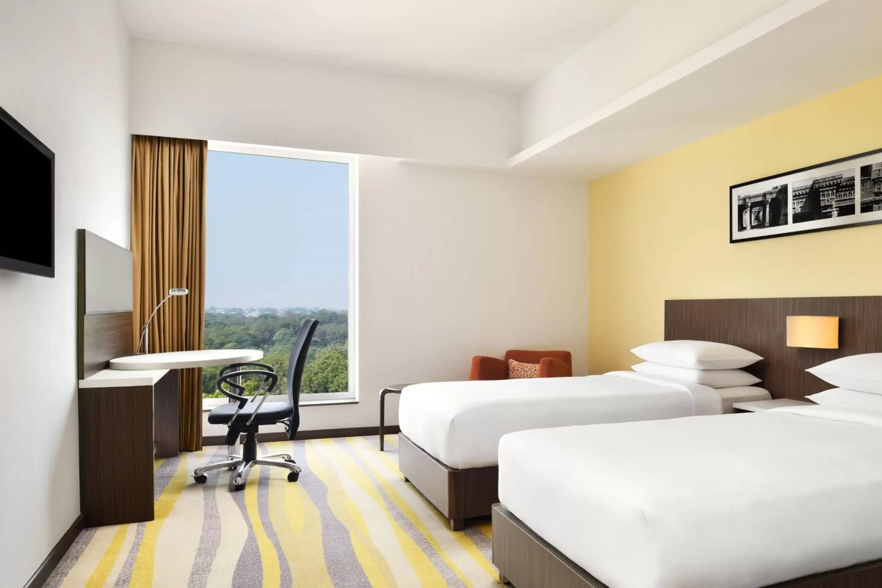 Photo of the whole room, Bed in Fairfield by Marriott Ahmedabad