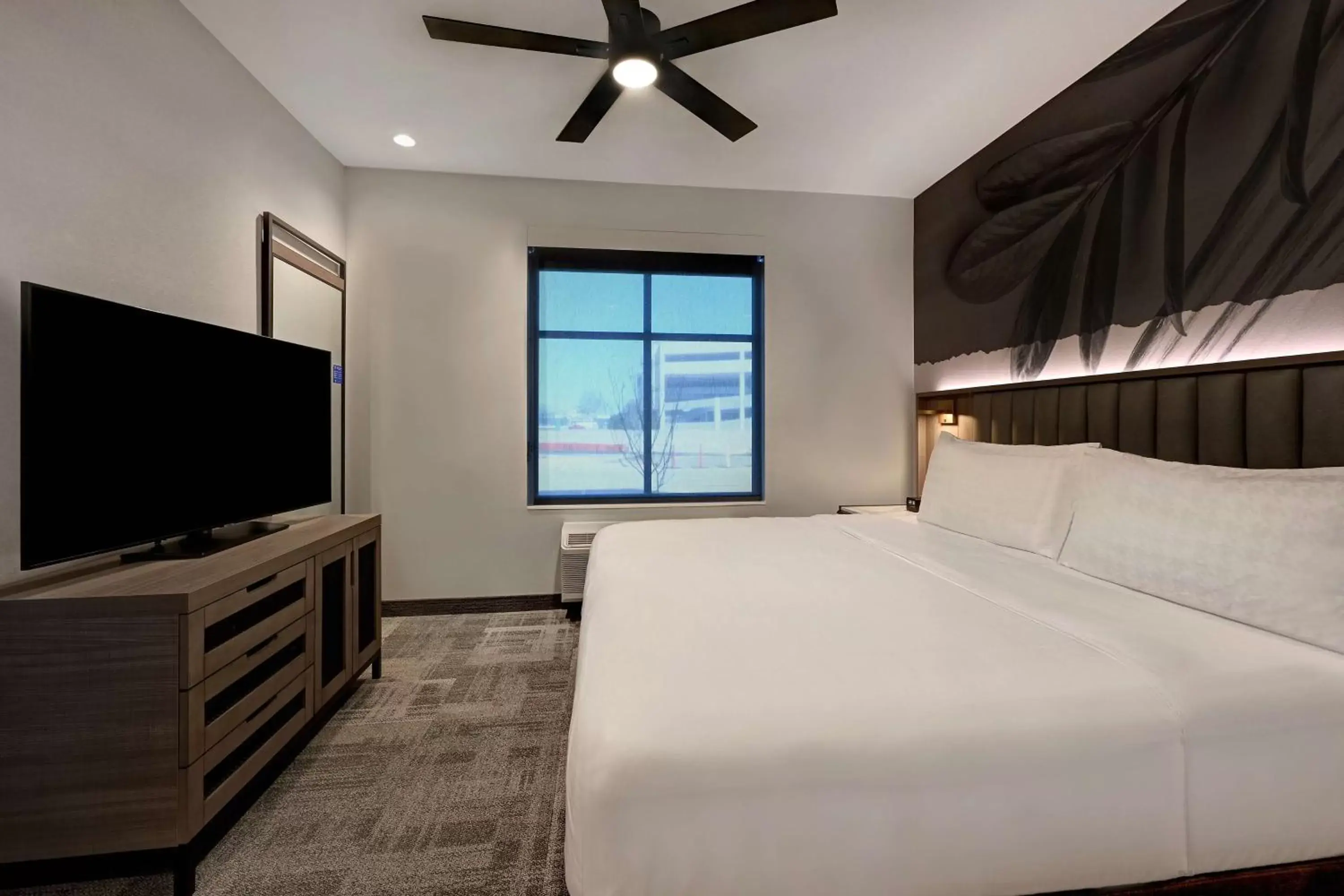 Bedroom, TV/Entertainment Center in Homewood Suites by Hilton Dallas The Colony