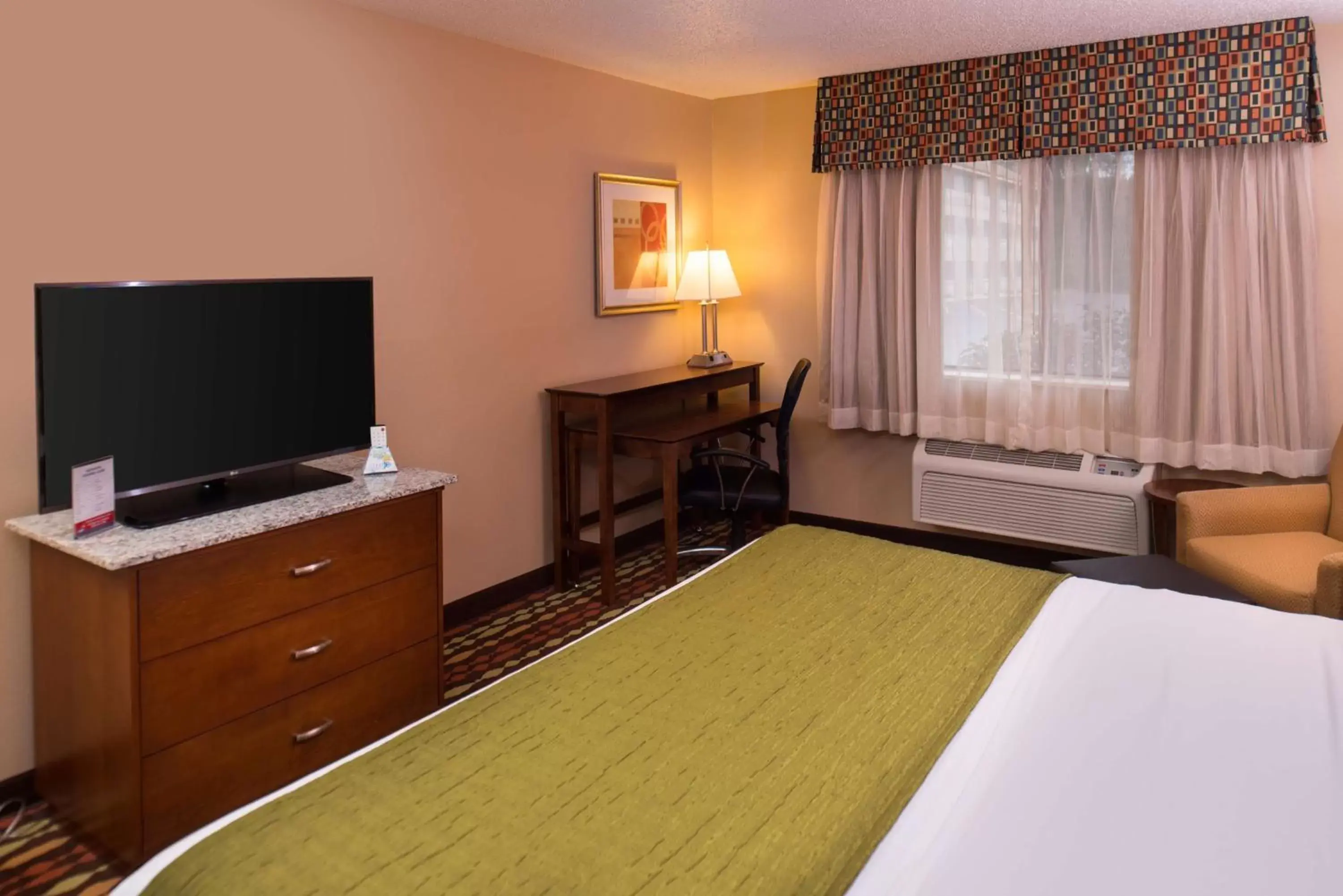 Photo of the whole room, TV/Entertainment Center in Best Western Ambassador Inn & Suites