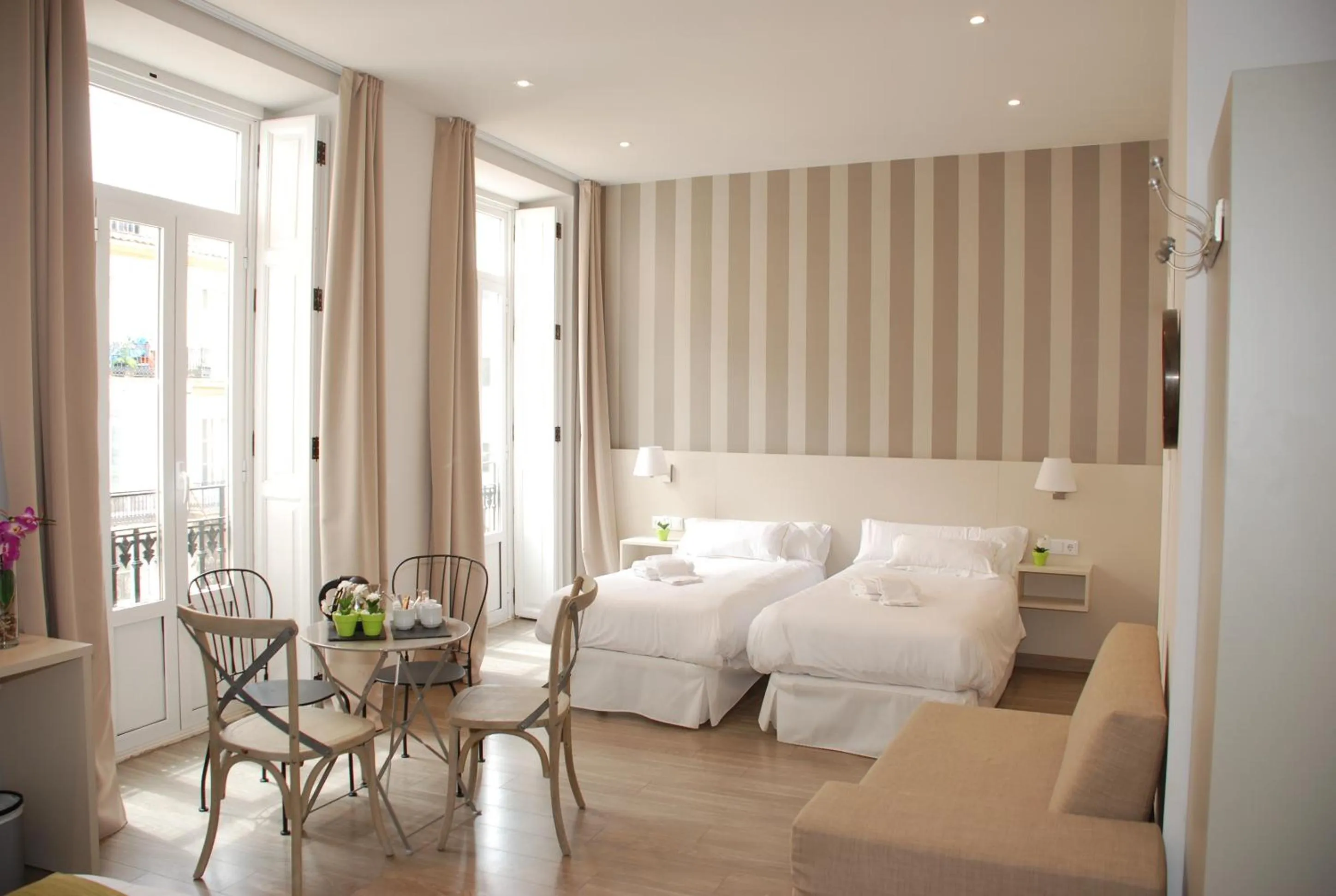 Photo of the whole room, Bed in Hotel San Lorenzo Boutique Plaza