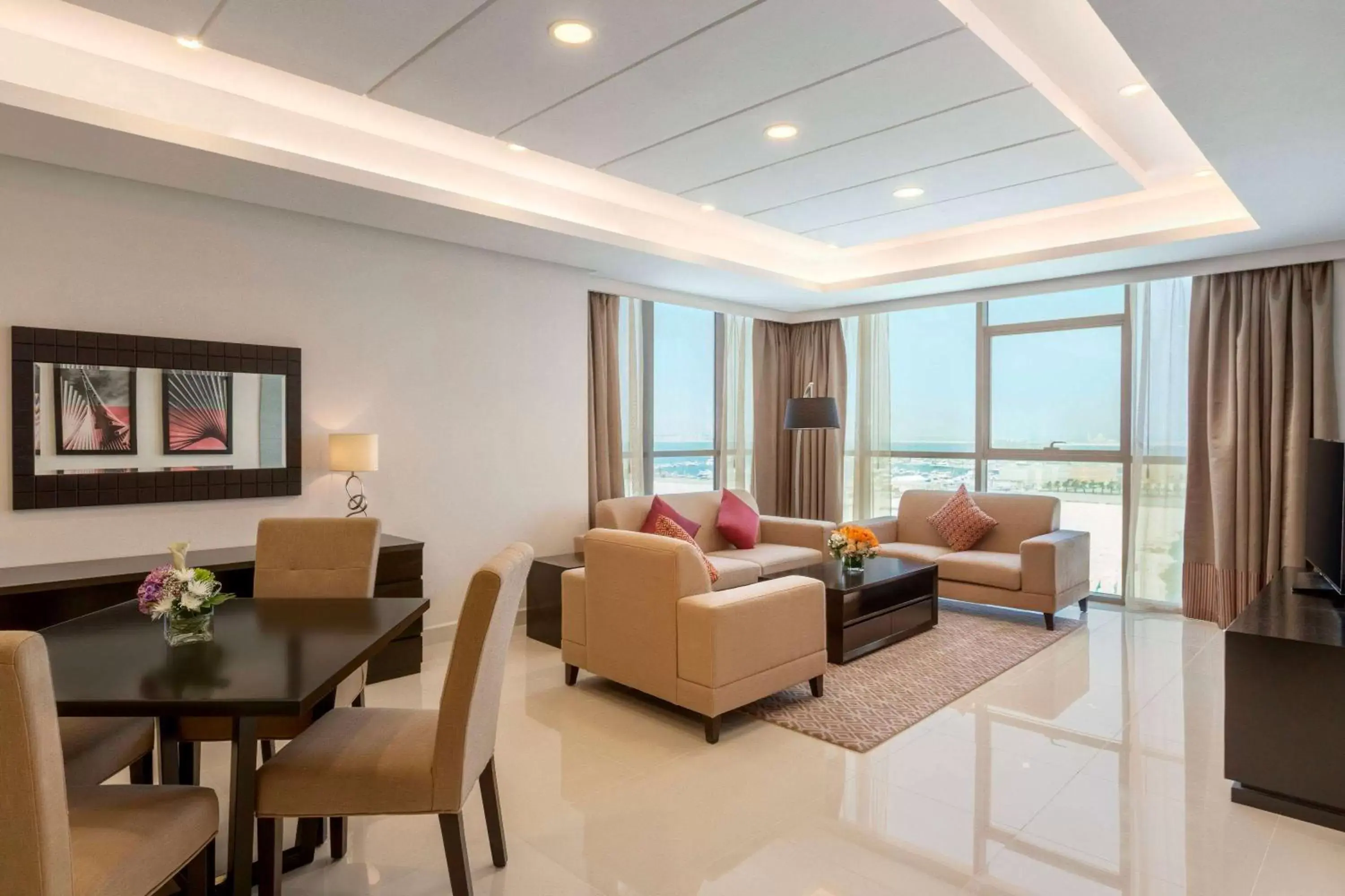 Bed, Seating Area in Ramada Hotel and Suites Amwaj Islands