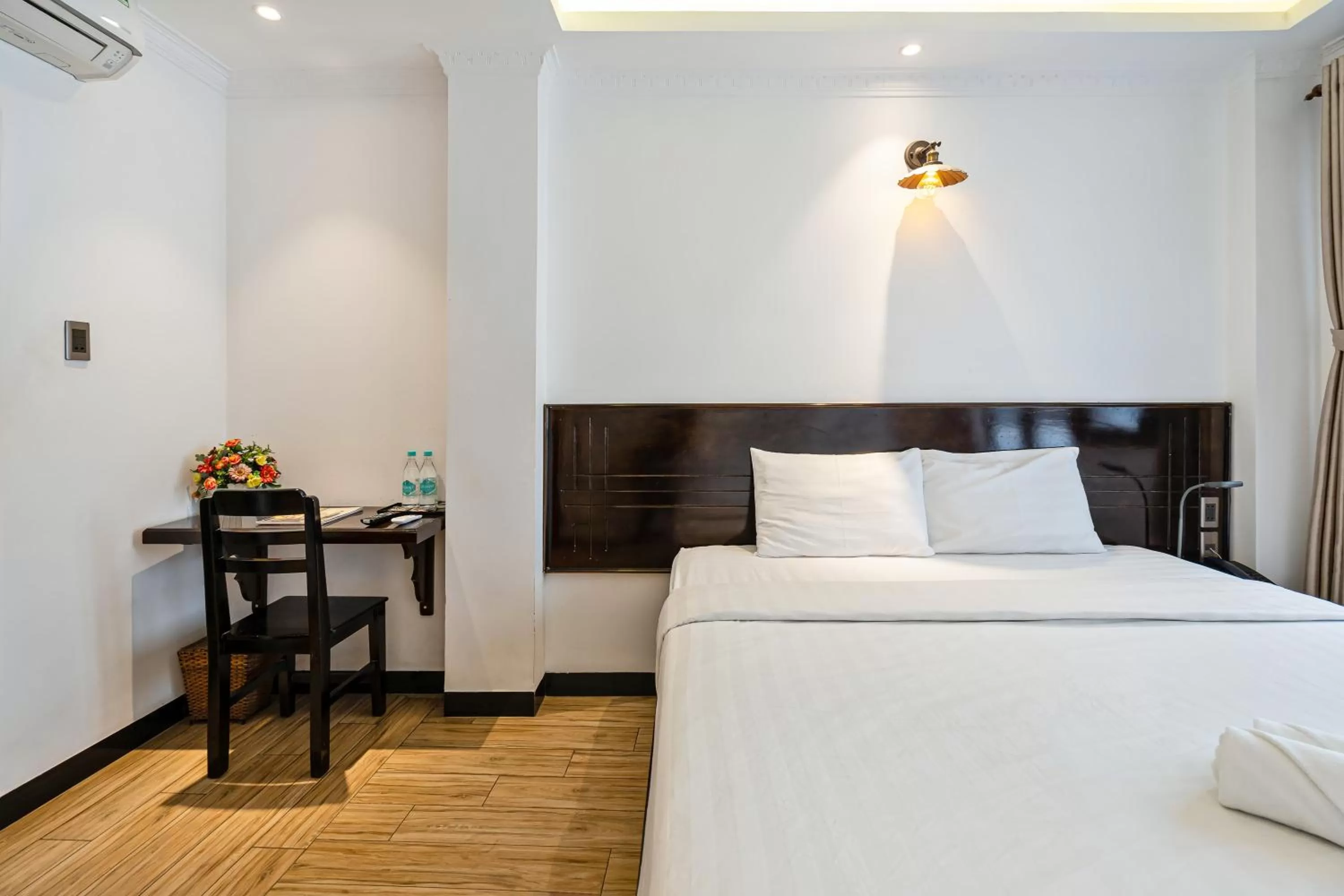 Bed in Lotus Laverne Hotel