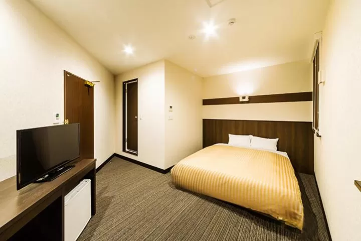 Bed in Hotel CASVI Tenjin