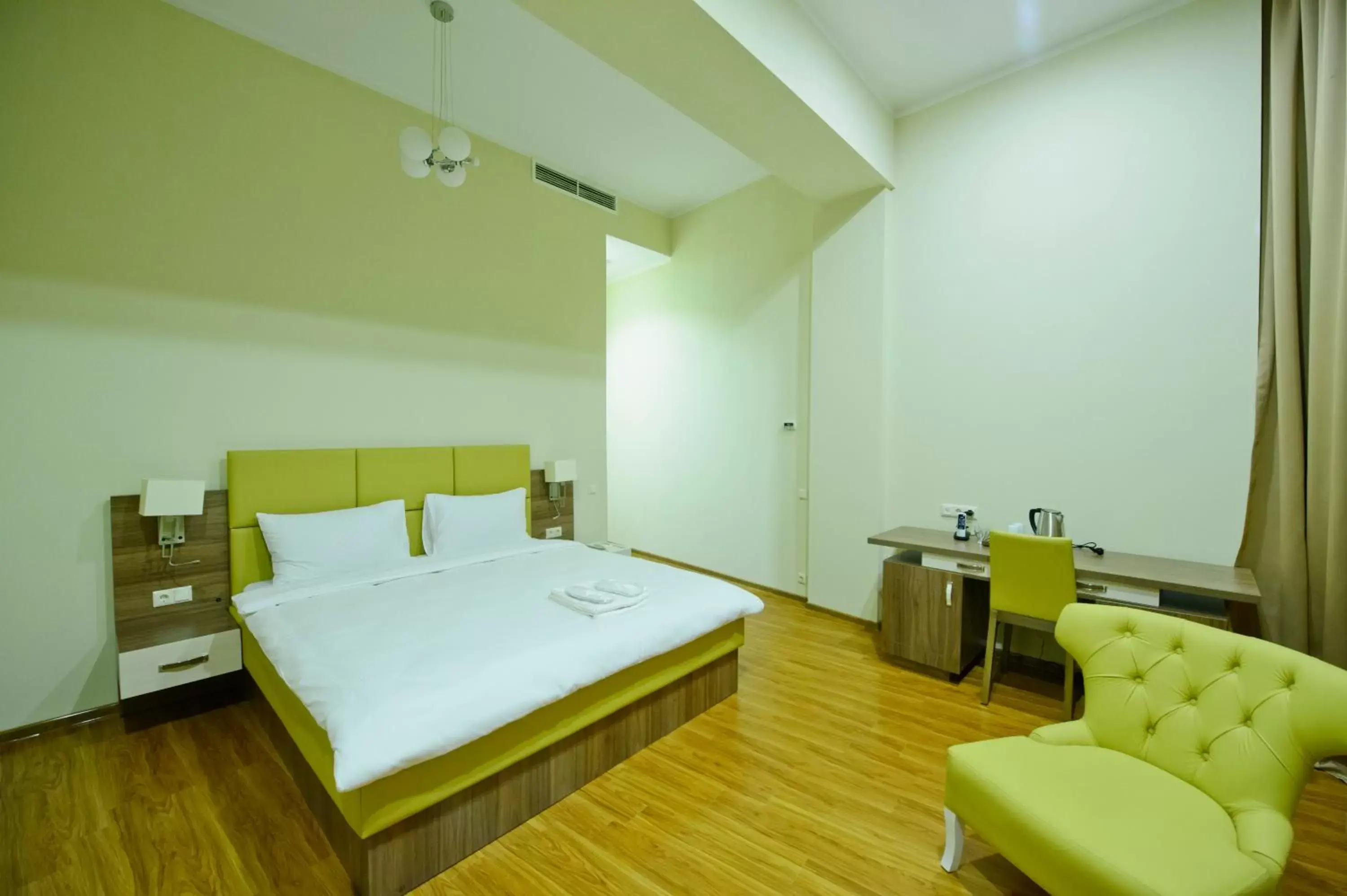 Seating area, Bed in Castello Mare Hotel Seating area, Bed in Castello Mare Hotel