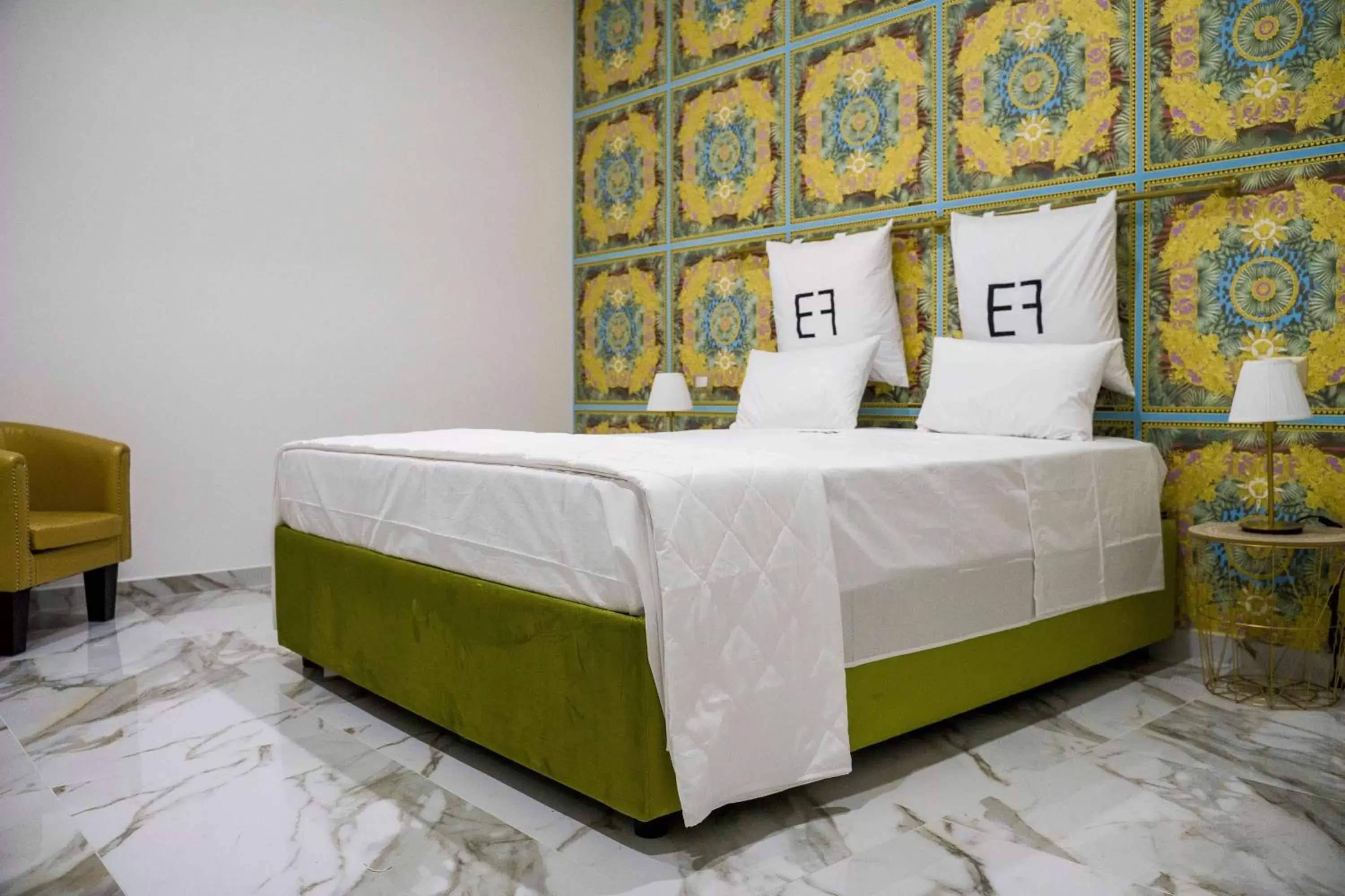 Bed in EF LUXURY LIVING RESORT AND SPA