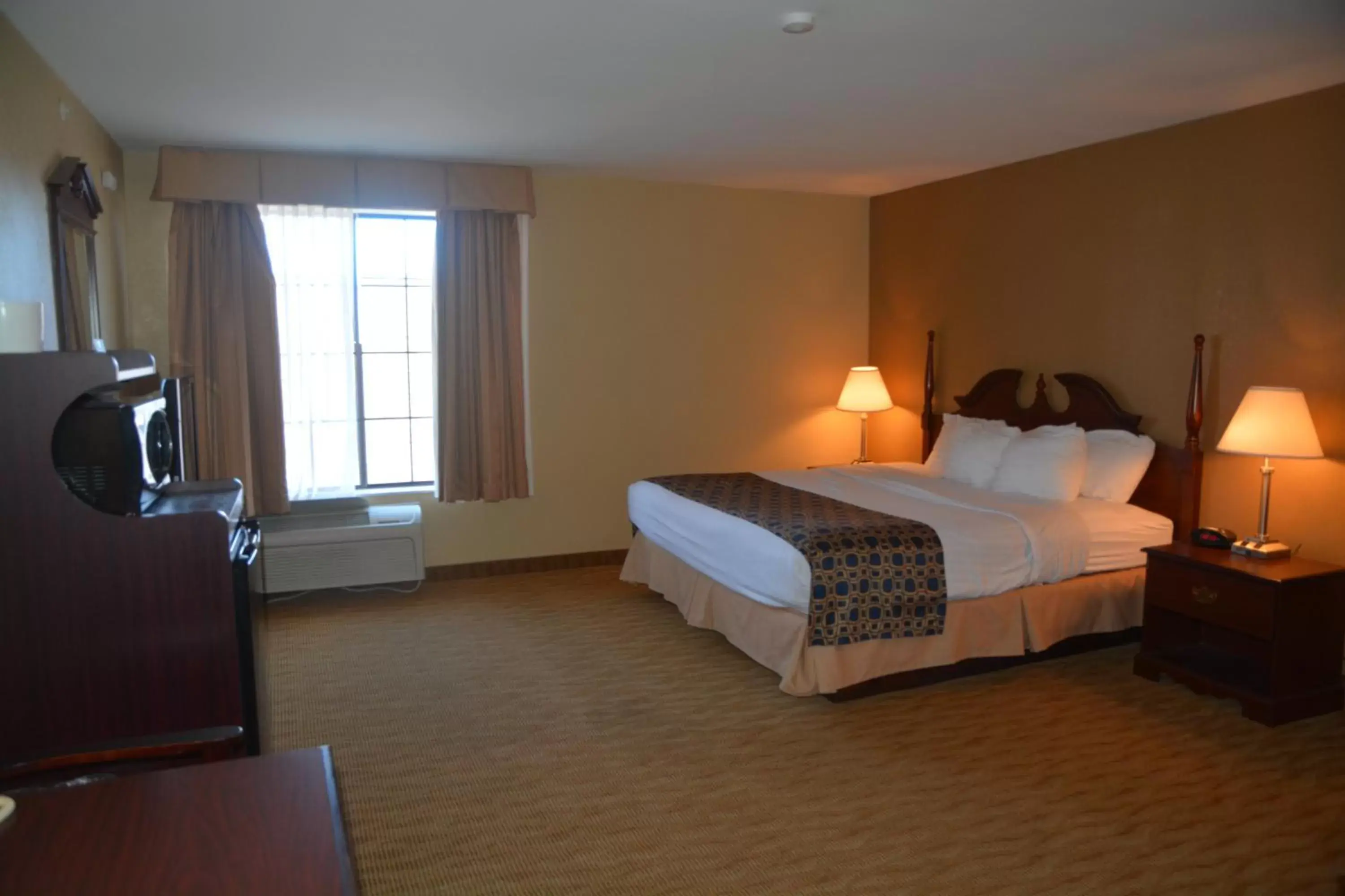 Bed in Countryside Inn and Suites