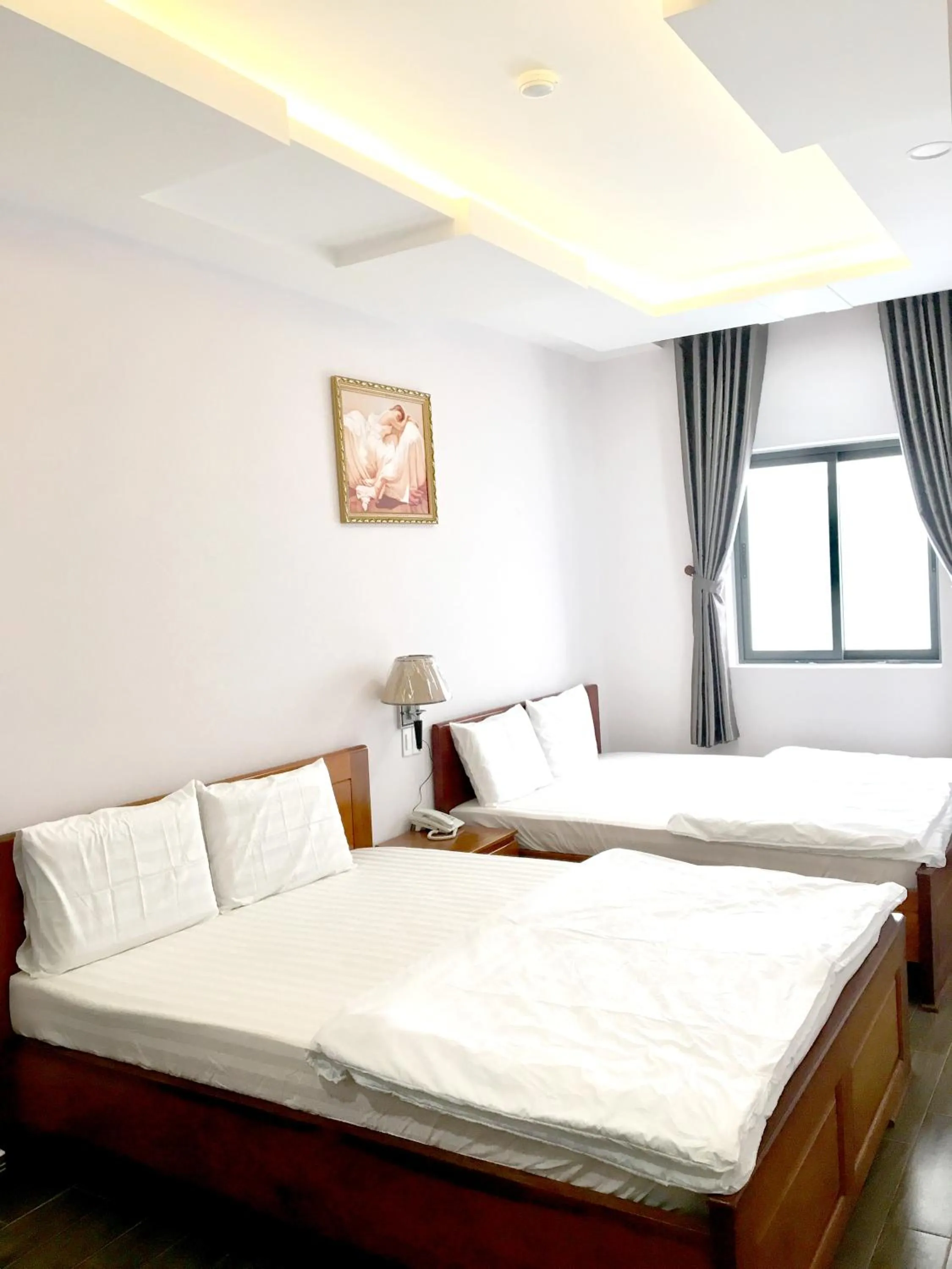 Bed in QUEEN VICTORIA Hotel