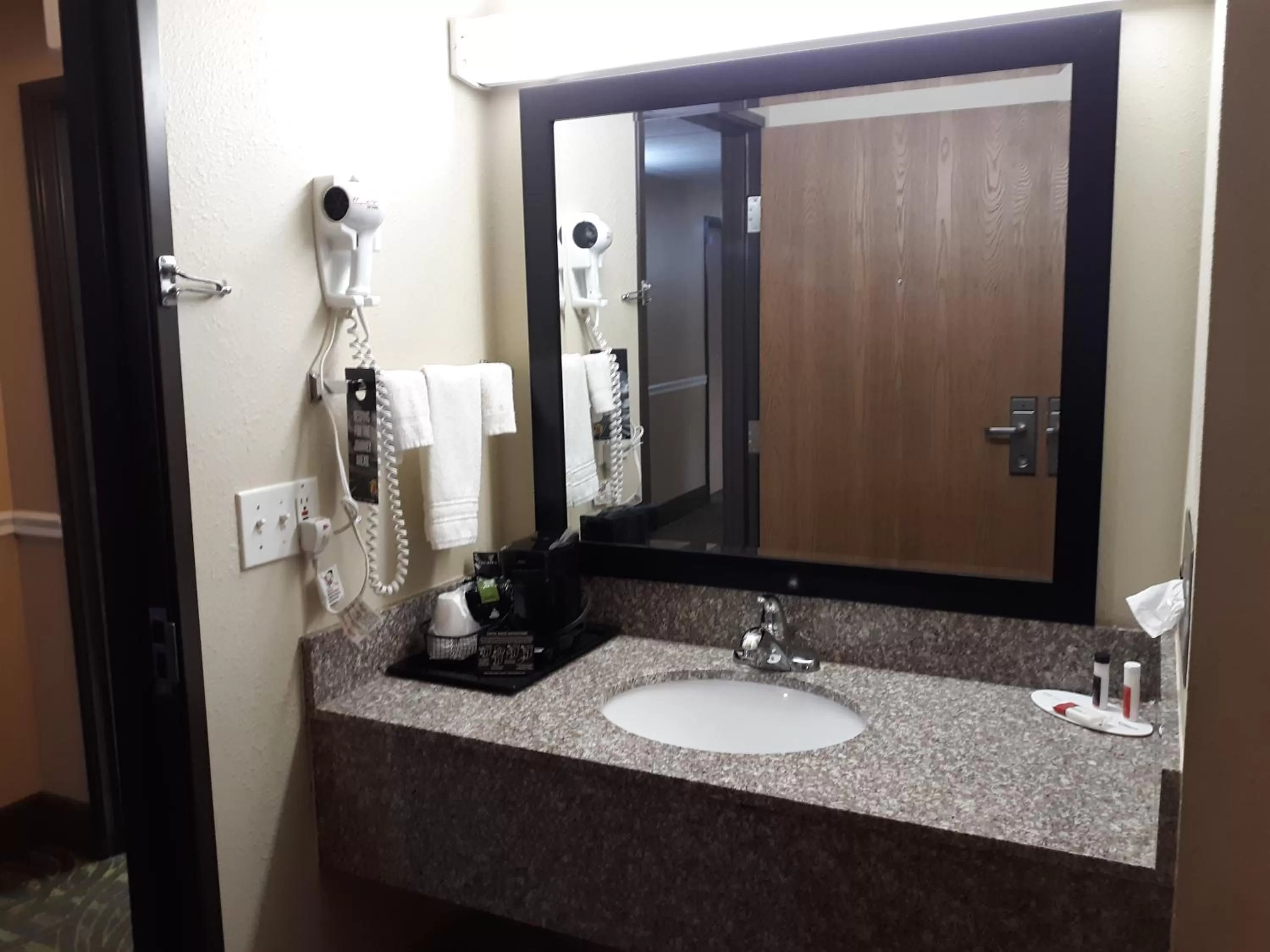 Bathroom in Super 8 by Wyndham Mound City