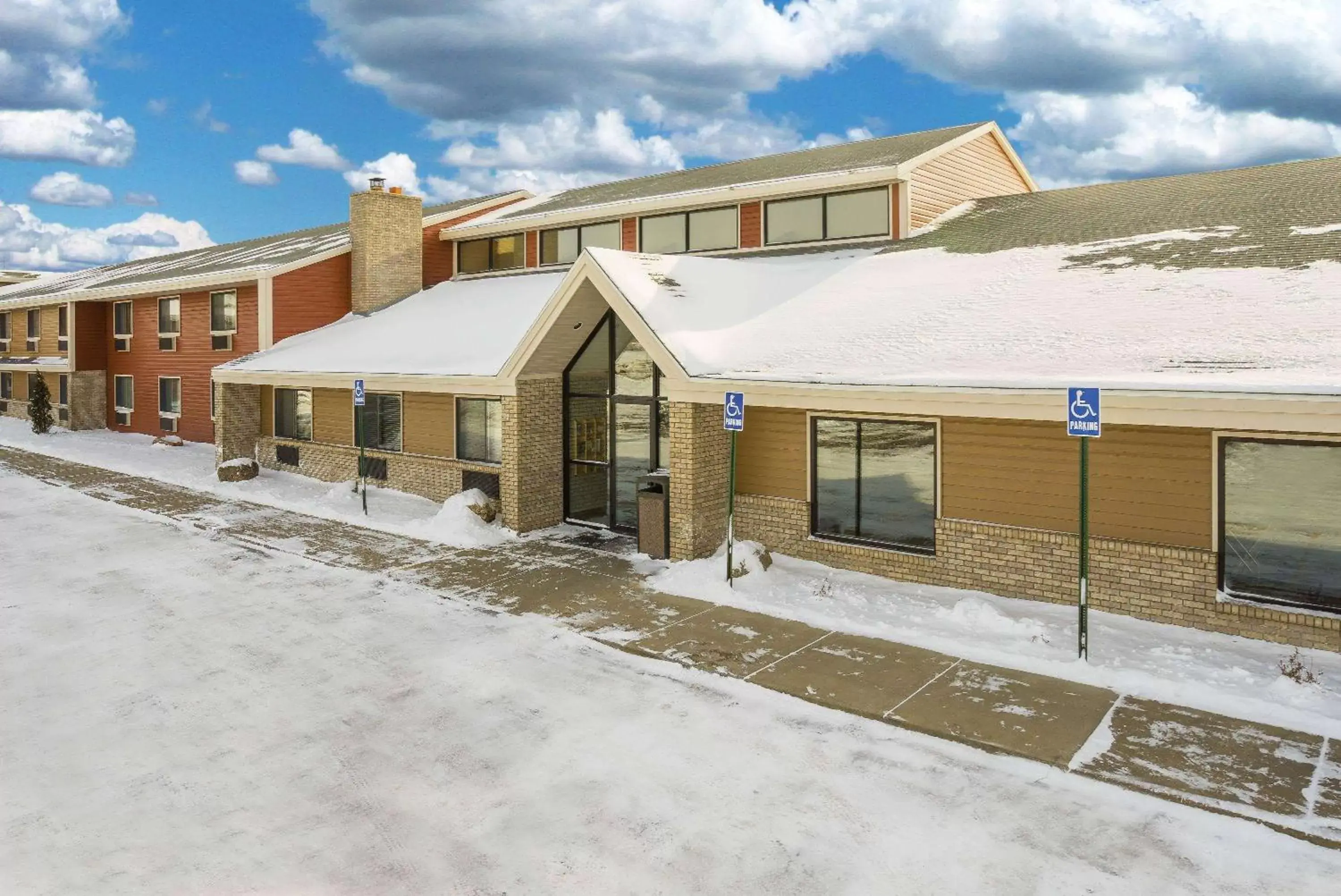 Property building, Winter in AmericInn by Wyndham Sioux Falls