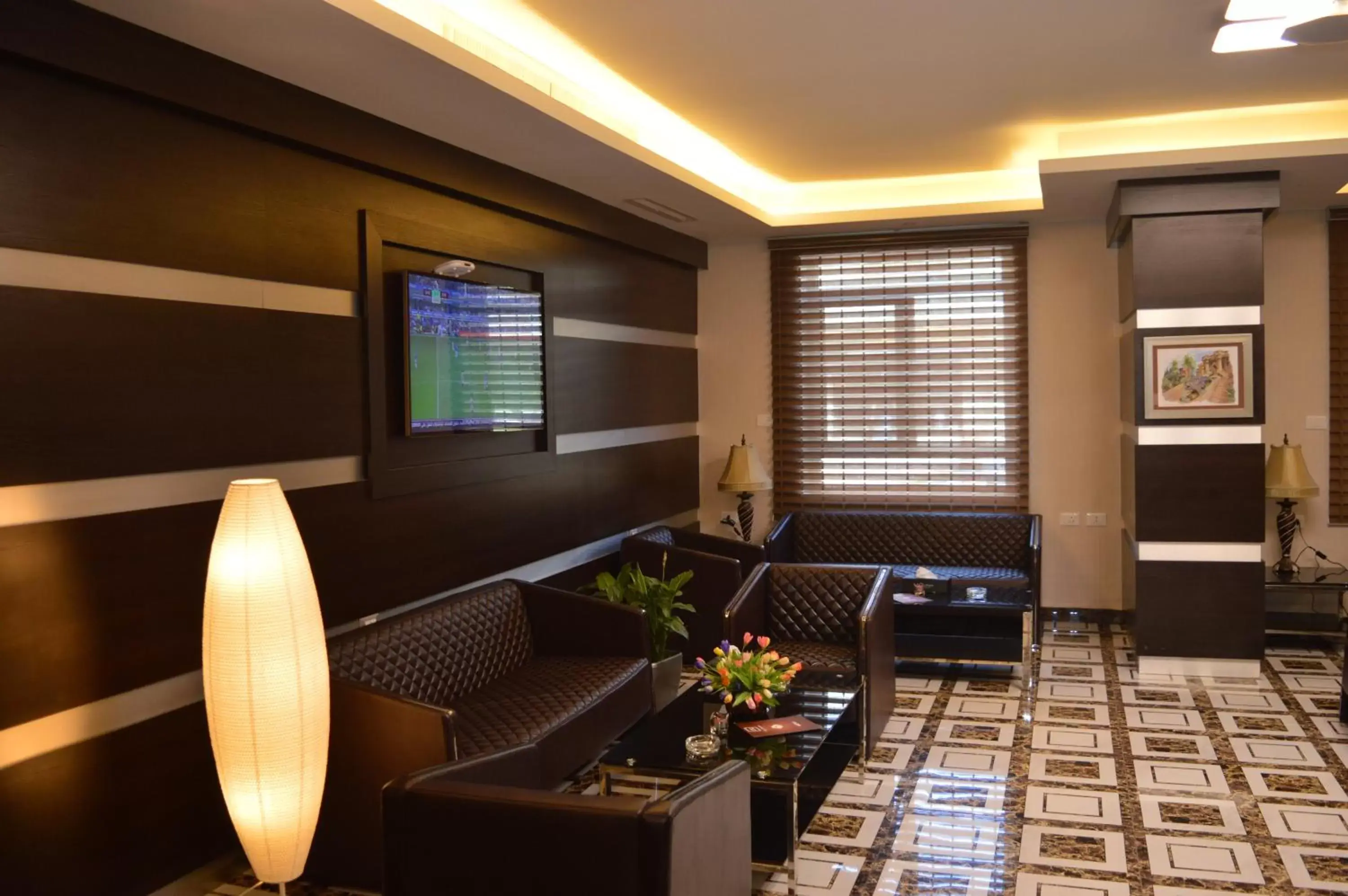 Lounge or bar in Tilal Almadina Hotel & Suites Lounge or bar in Tilal Almadina Hotel & Suites