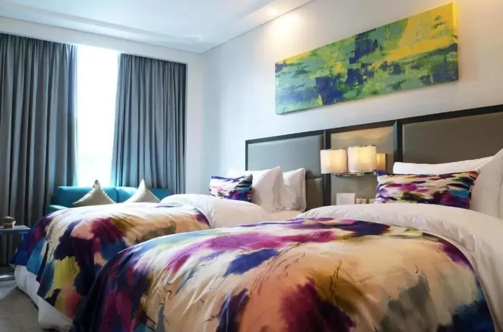 Bed in Savoy Hotel Manila