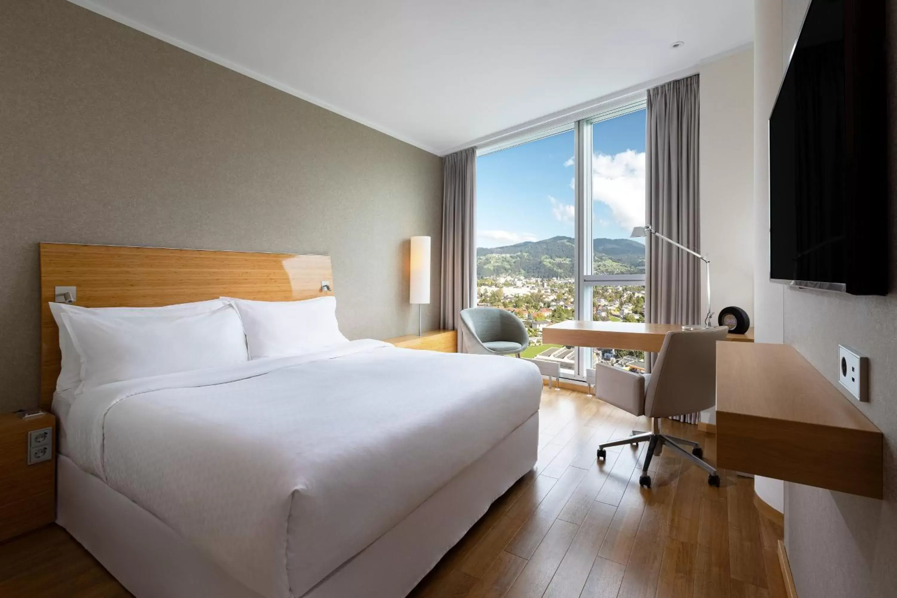 Photo of the whole room in Four Points by Sheraton Panoramahaus Dornbirn