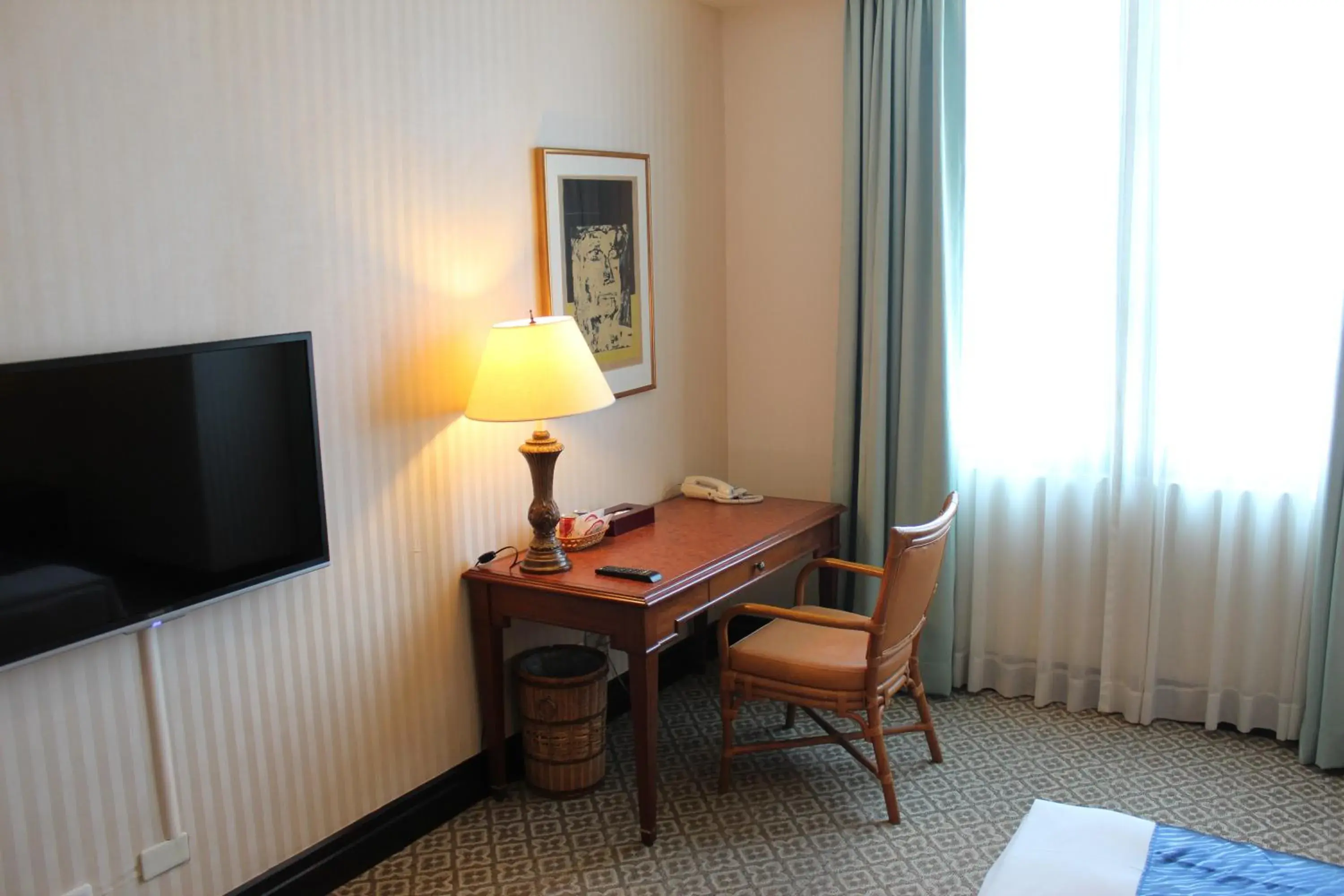 Seating area, TV/Entertainment Center in Wei-Yat Grand Hotel