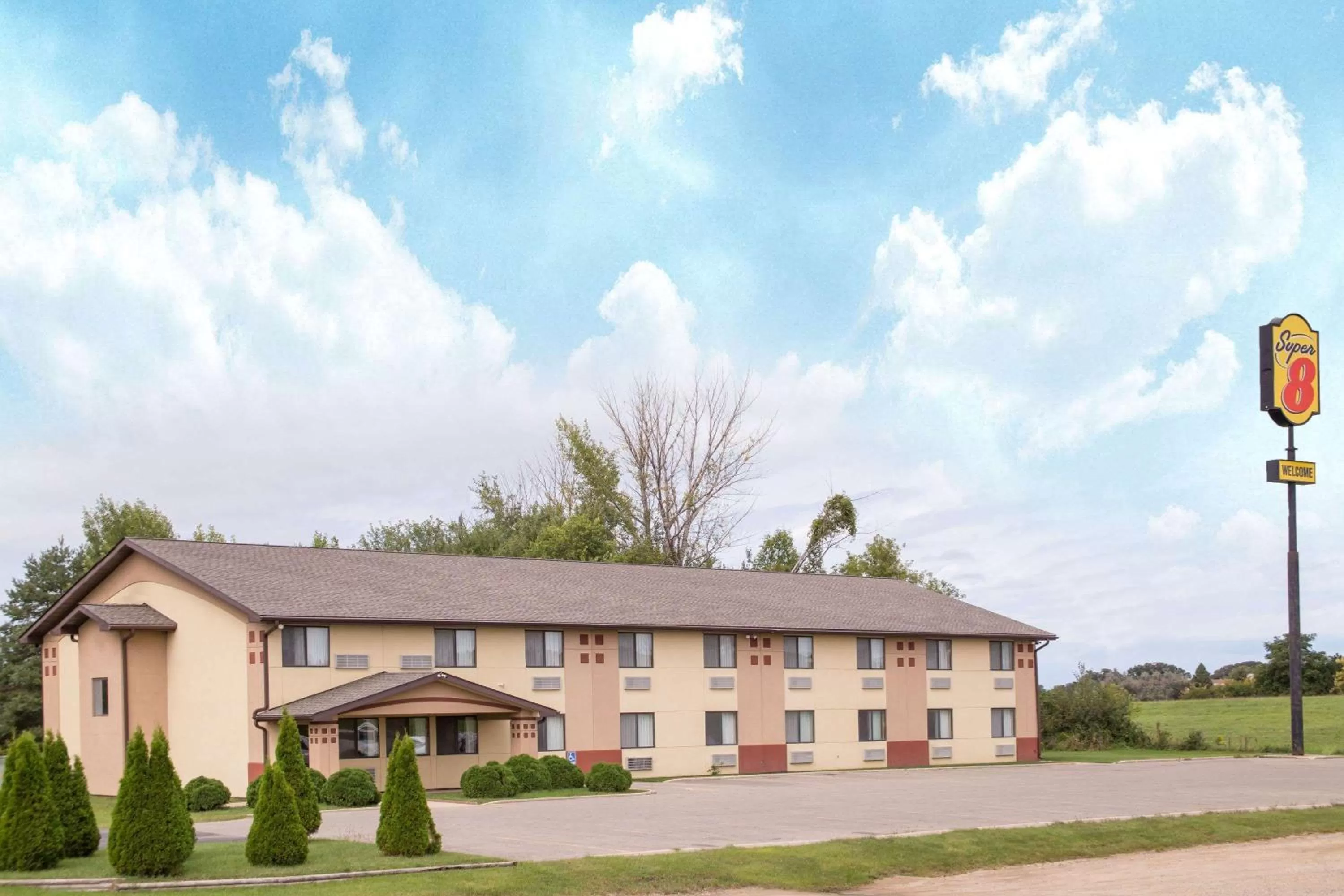 Property building in Super 8 by Wyndham Austin MN