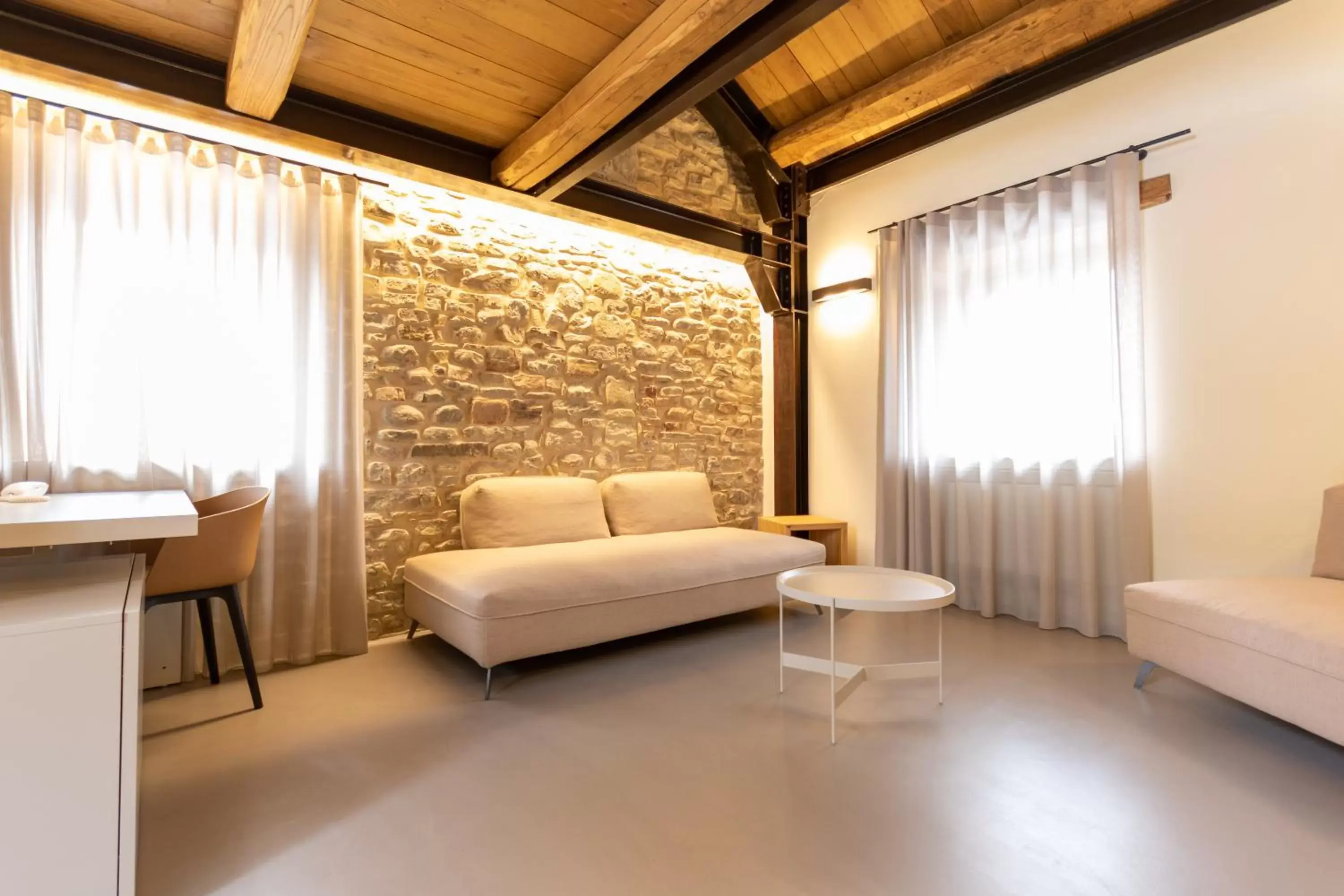 Photo of the whole room, Seating Area in Borgotufi Albergo Diffuso