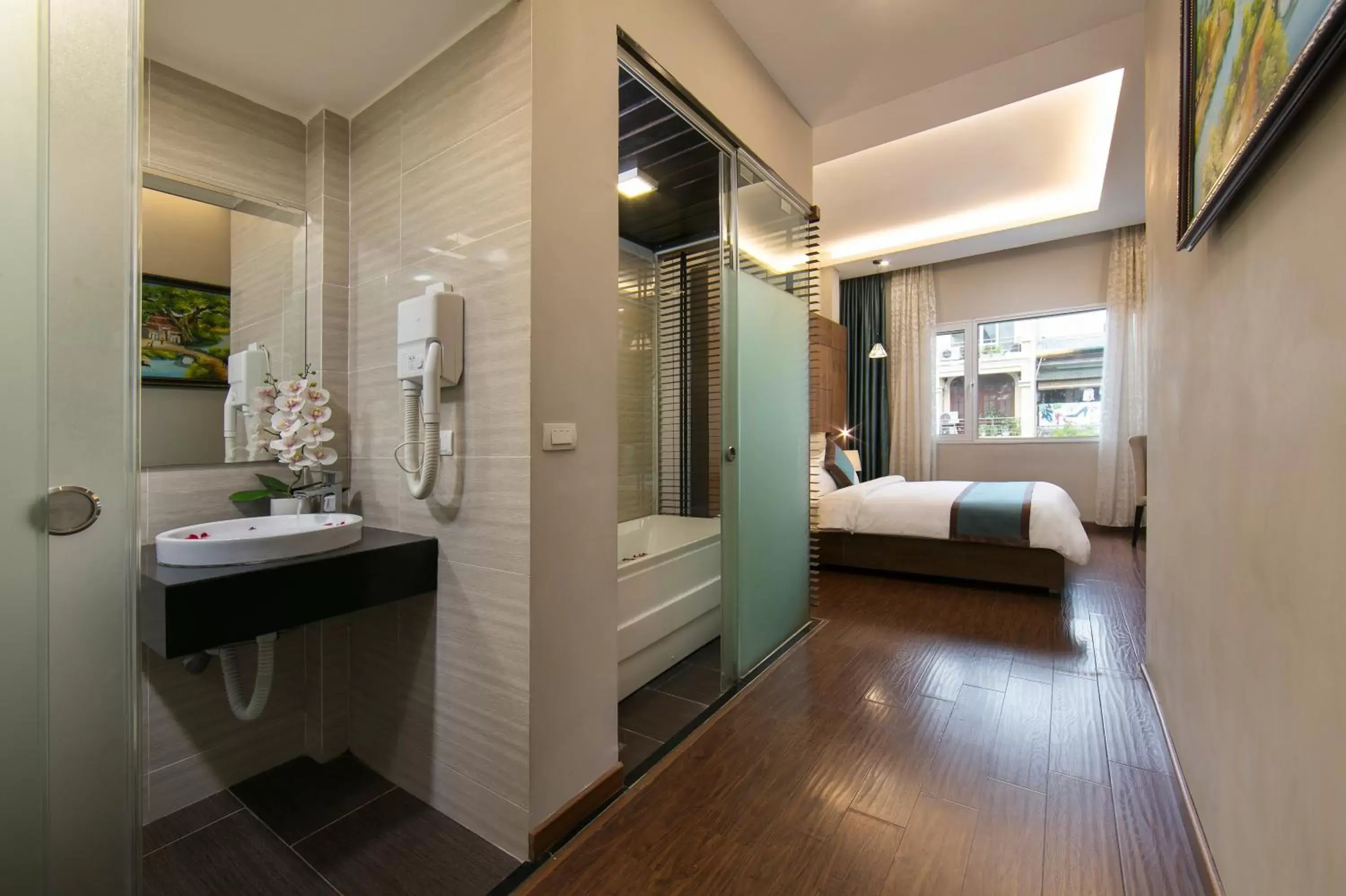 Photo of the whole room, Bathroom in Bonne Nuit Hotel & Spa Hanoi