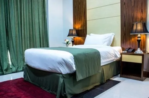 Bed in Doha Dynasty Hotel