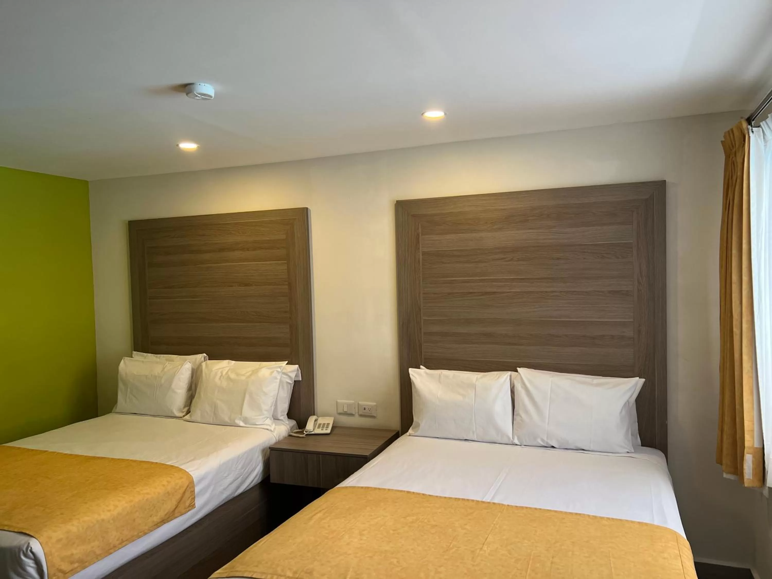 Bed in Hotel Bugambilia