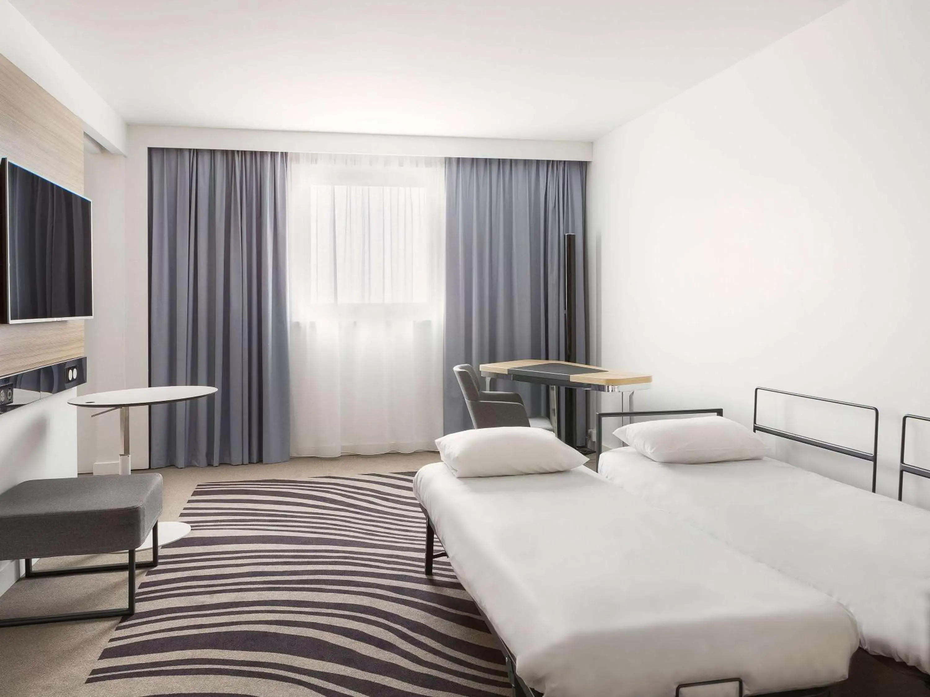 Photo of the whole room, Bed in Novotel Paris Charles de Gaulle Airport