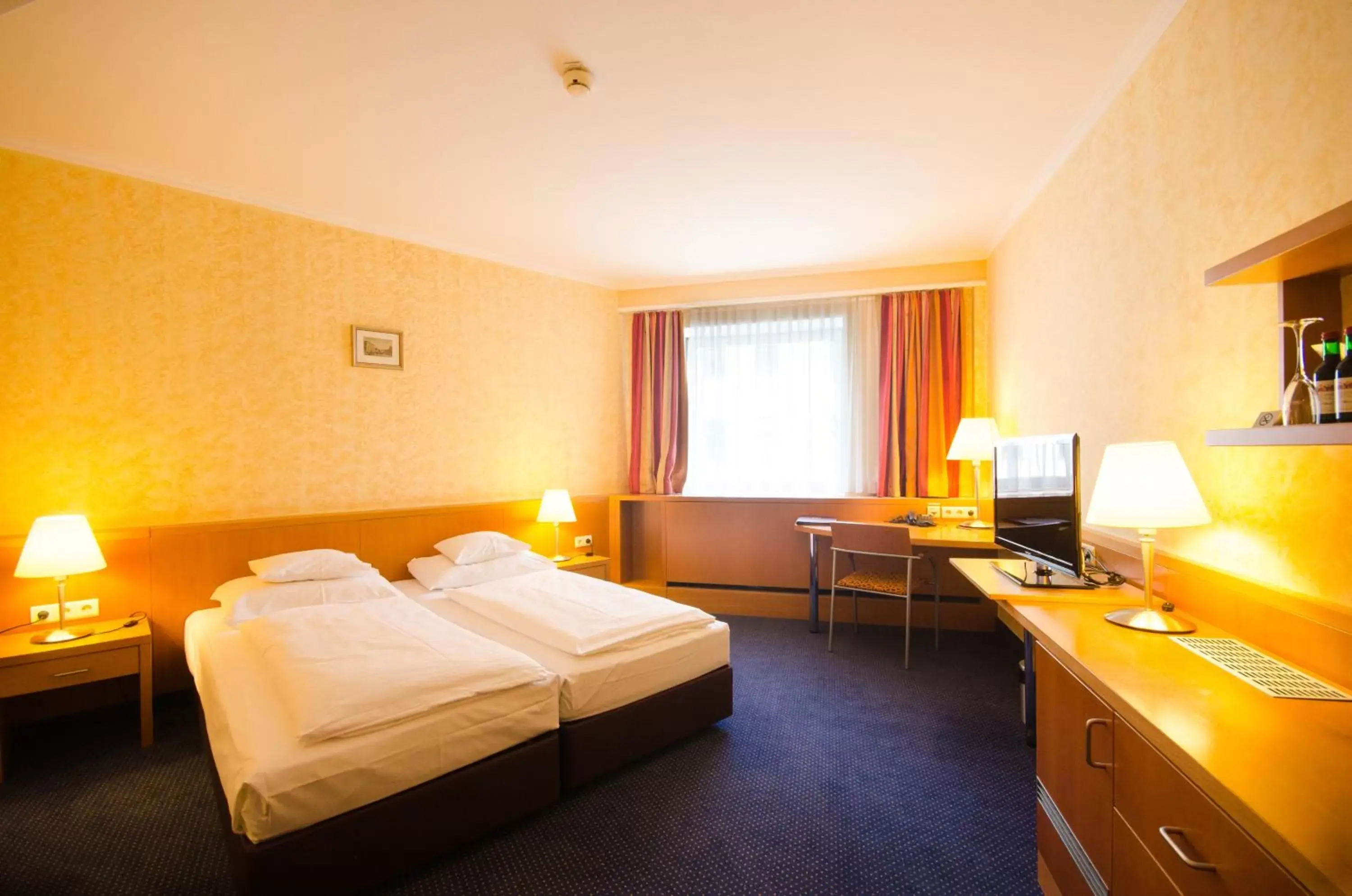 Bedroom in Hotel & Palais Strudlhof