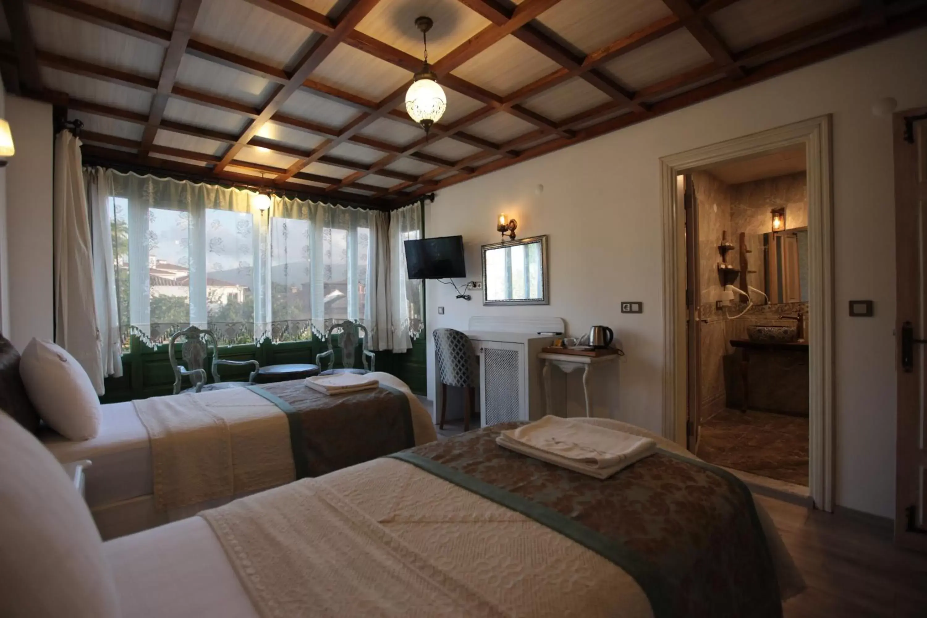 Bed in Celsus Boutique Hotel