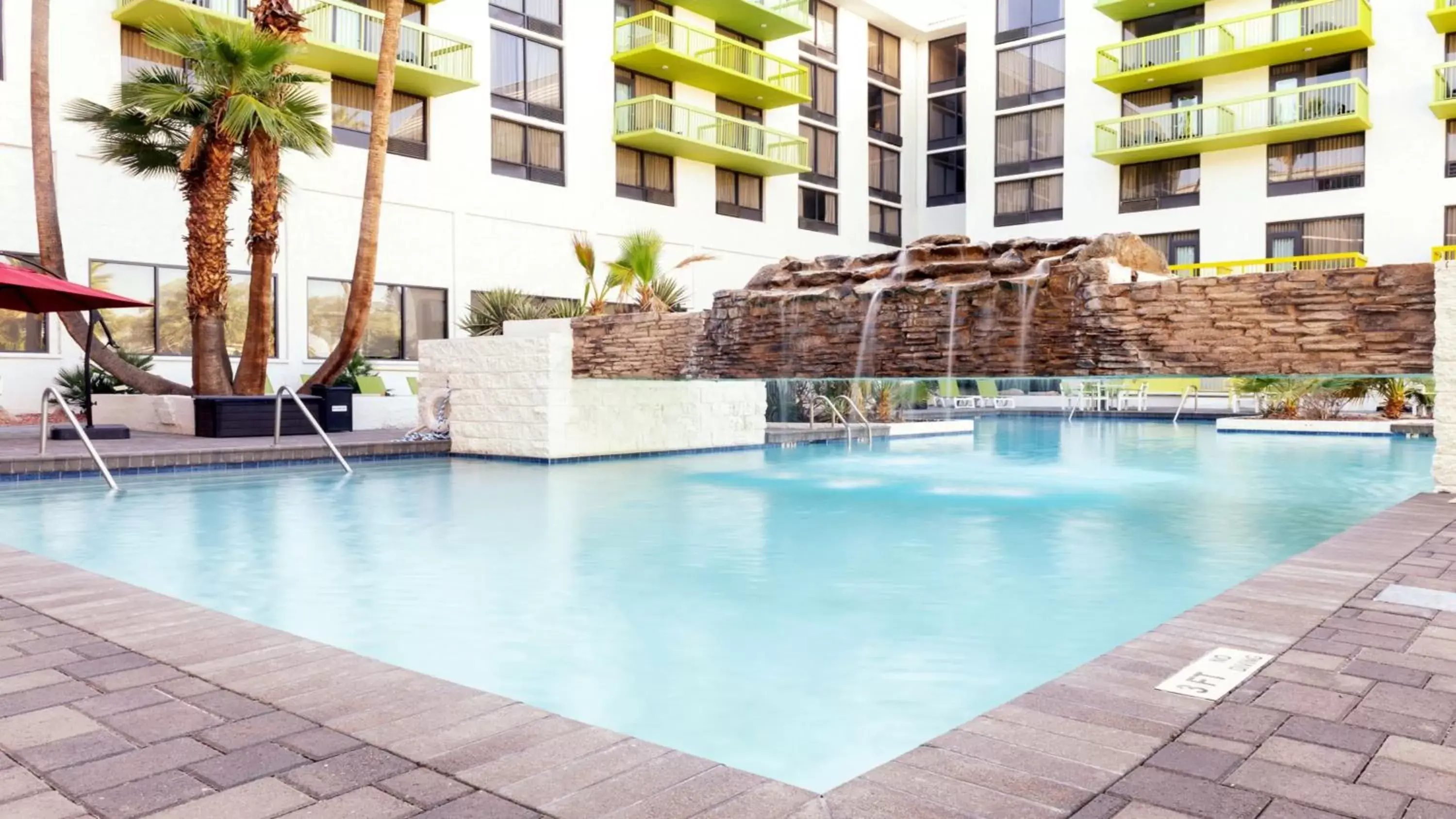 Swimming pool in Holiday Inn Phoenix-Mesa Chandler by IHG Swimming pool in Holiday Inn Phoenix-Mesa Chandler by IHG