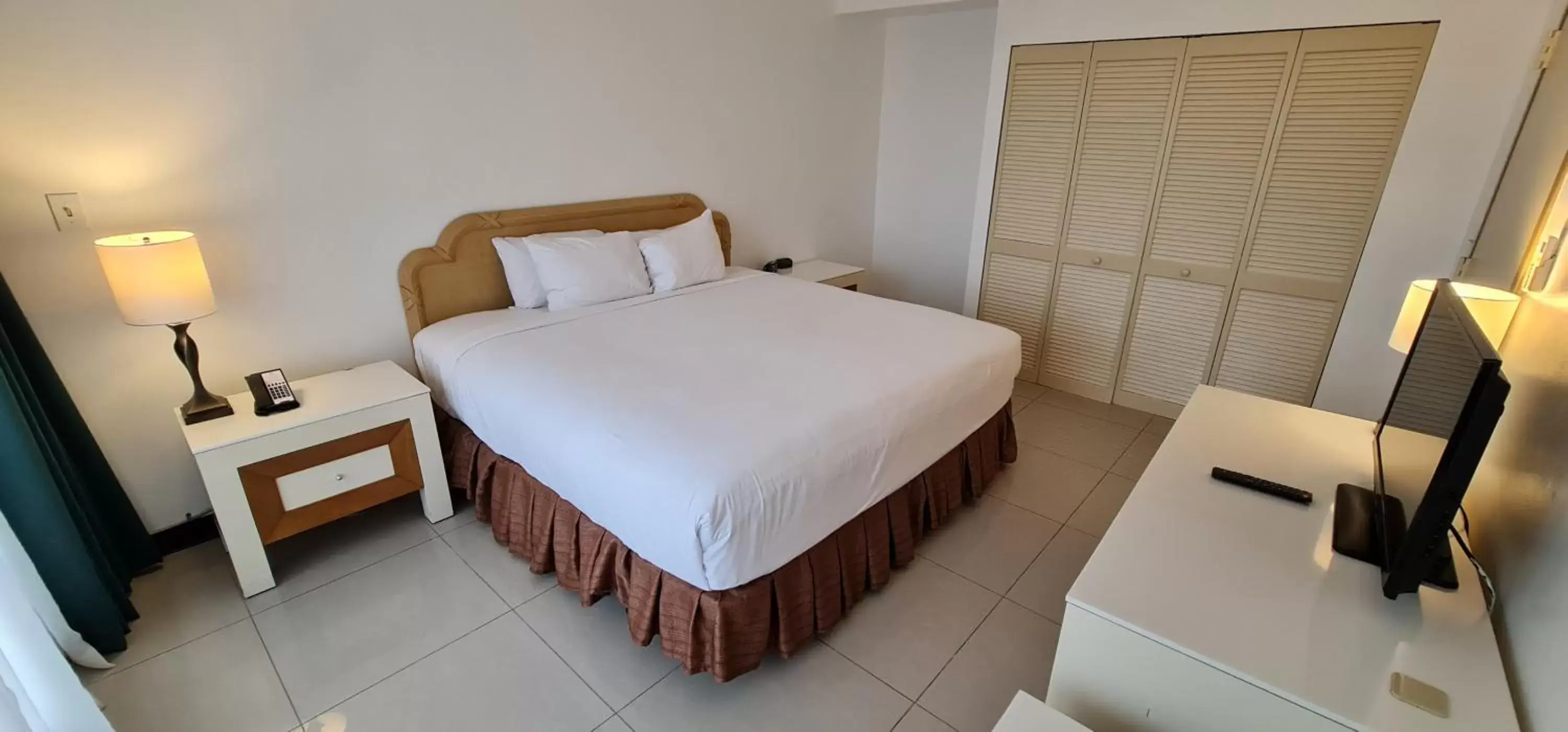 Bed in SureStay Hotel by Best Western Guam Palmridge