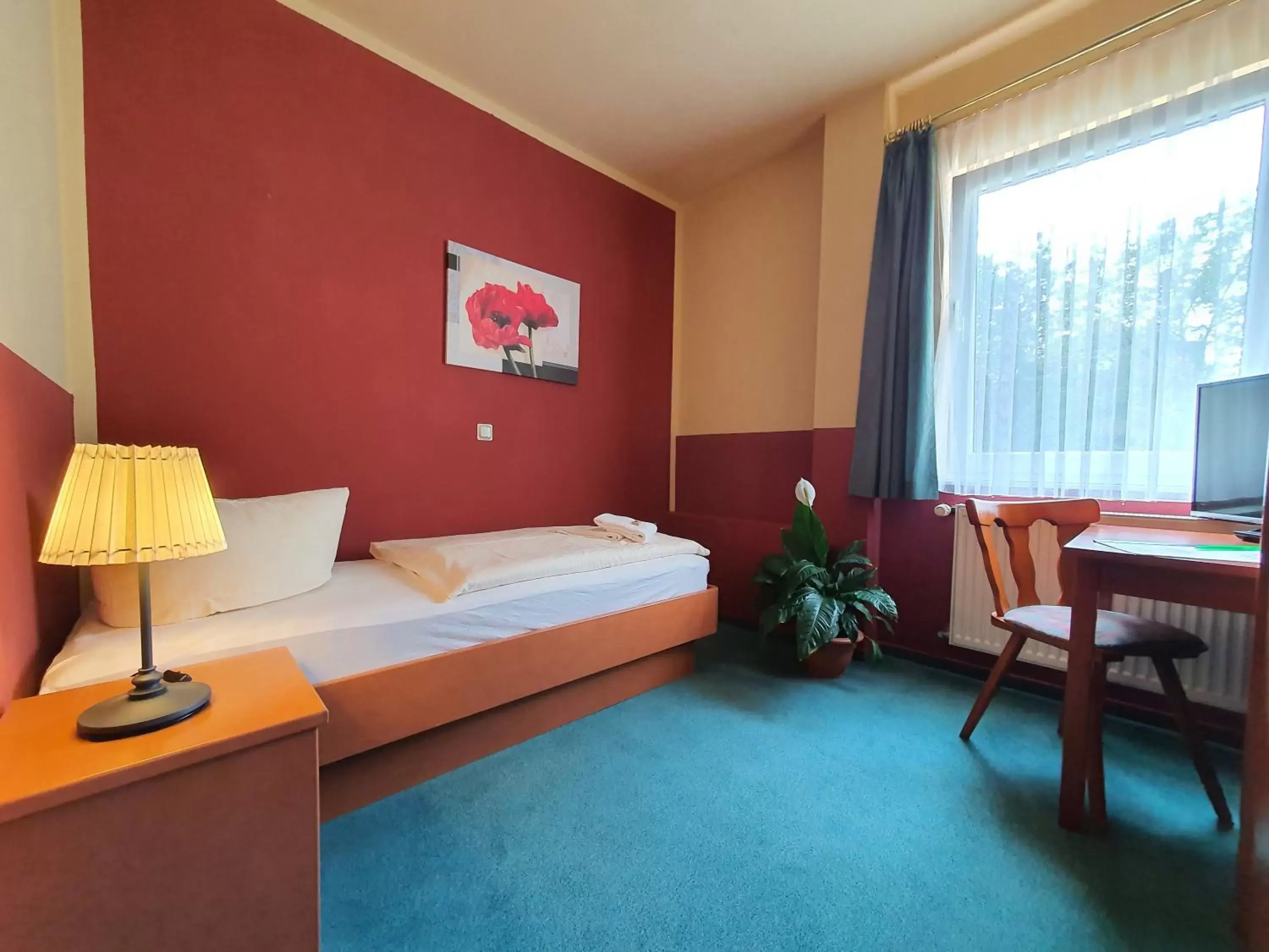 Bed in Altstadthotel Ilsenburg Bed in Altstadthotel Ilsenburg