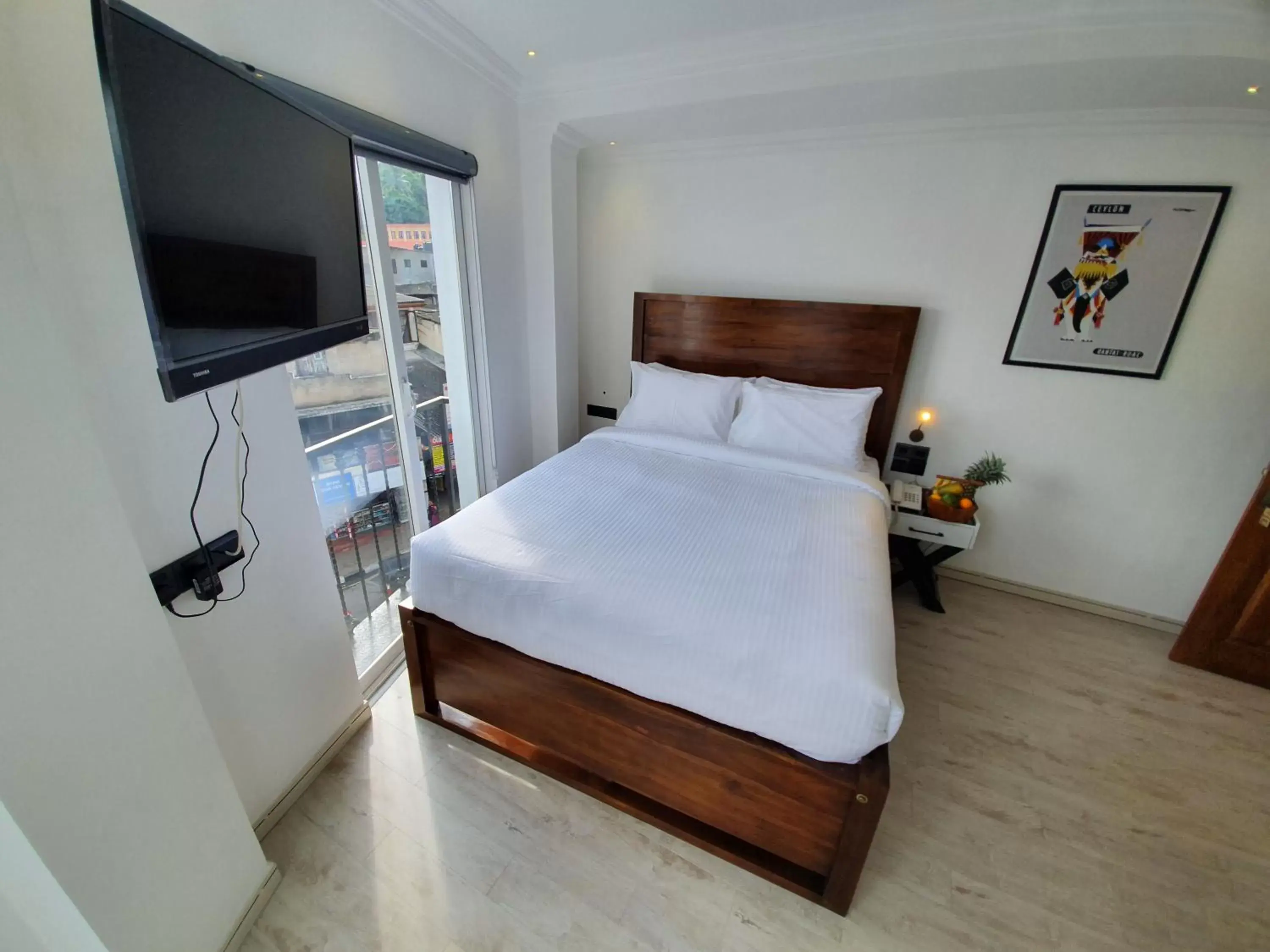 Semi-Deluxe Room With French Balcony. - single occupancy in Bed Station 210 Semi-Deluxe Room With French Balcony. - single occupancy in Bed Station 210