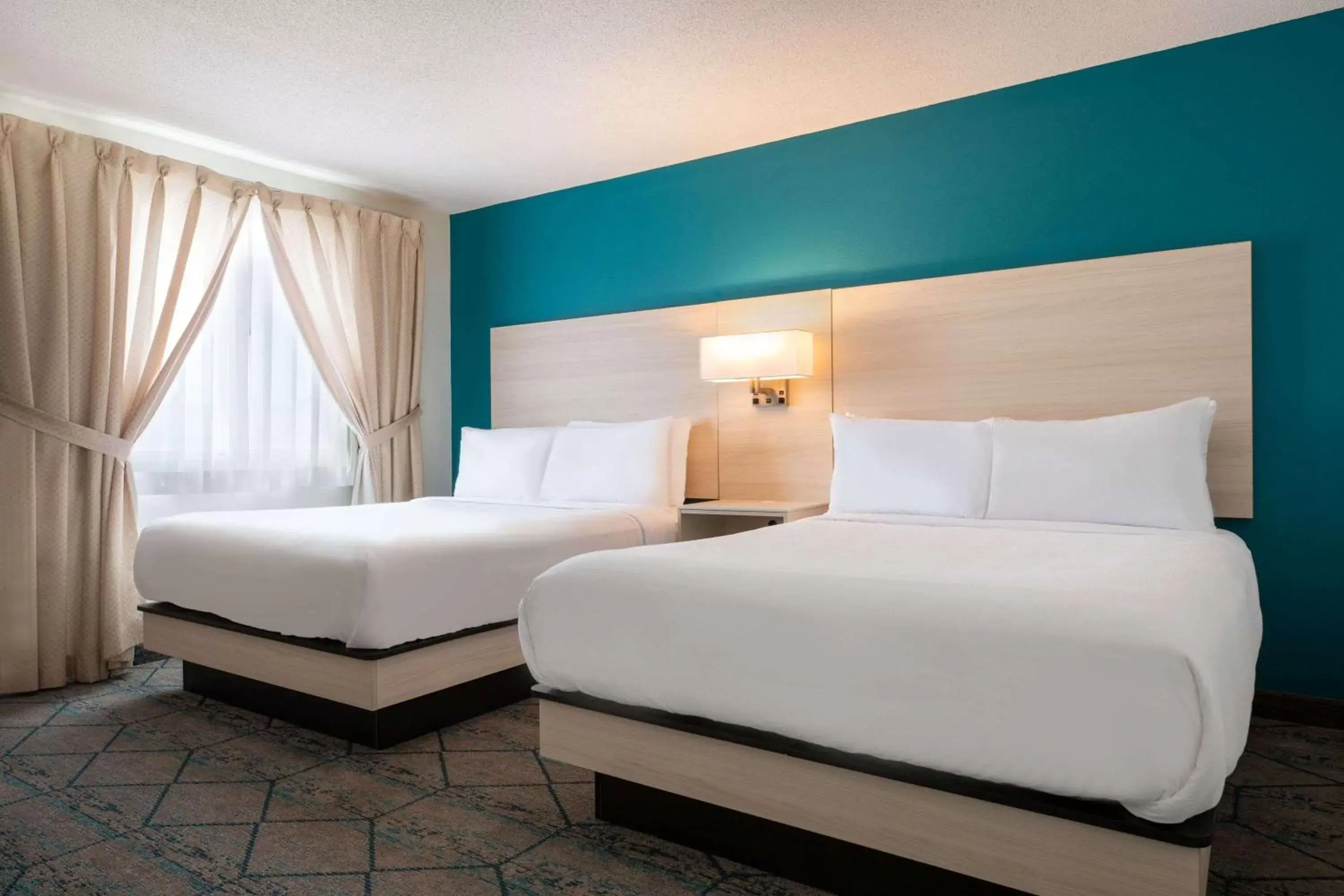 Bedroom, Bed in Ramada by Wyndham Miramichi New Brunswick