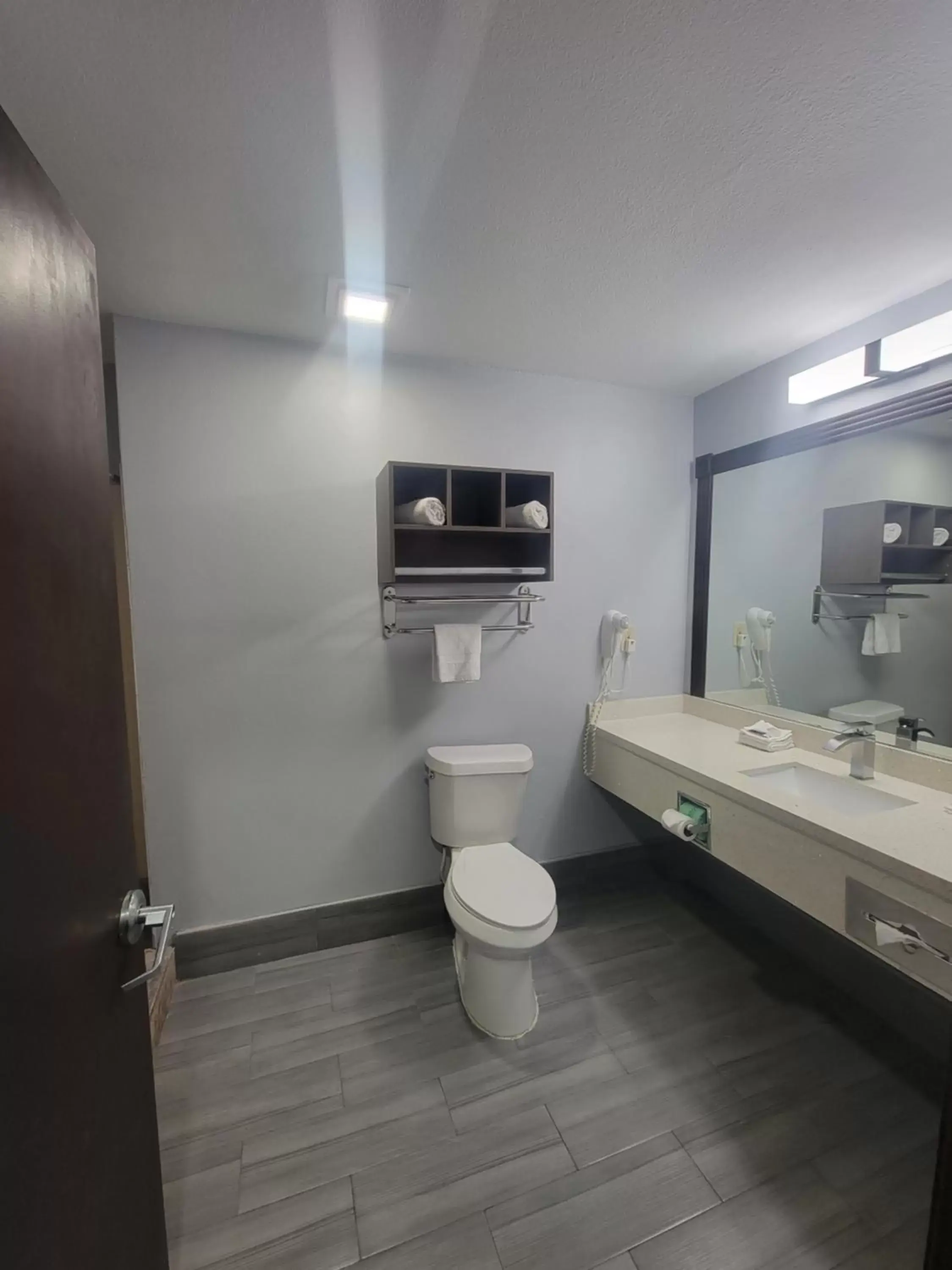 Toilet, Bathroom in Blue Bay Inn and Suites
