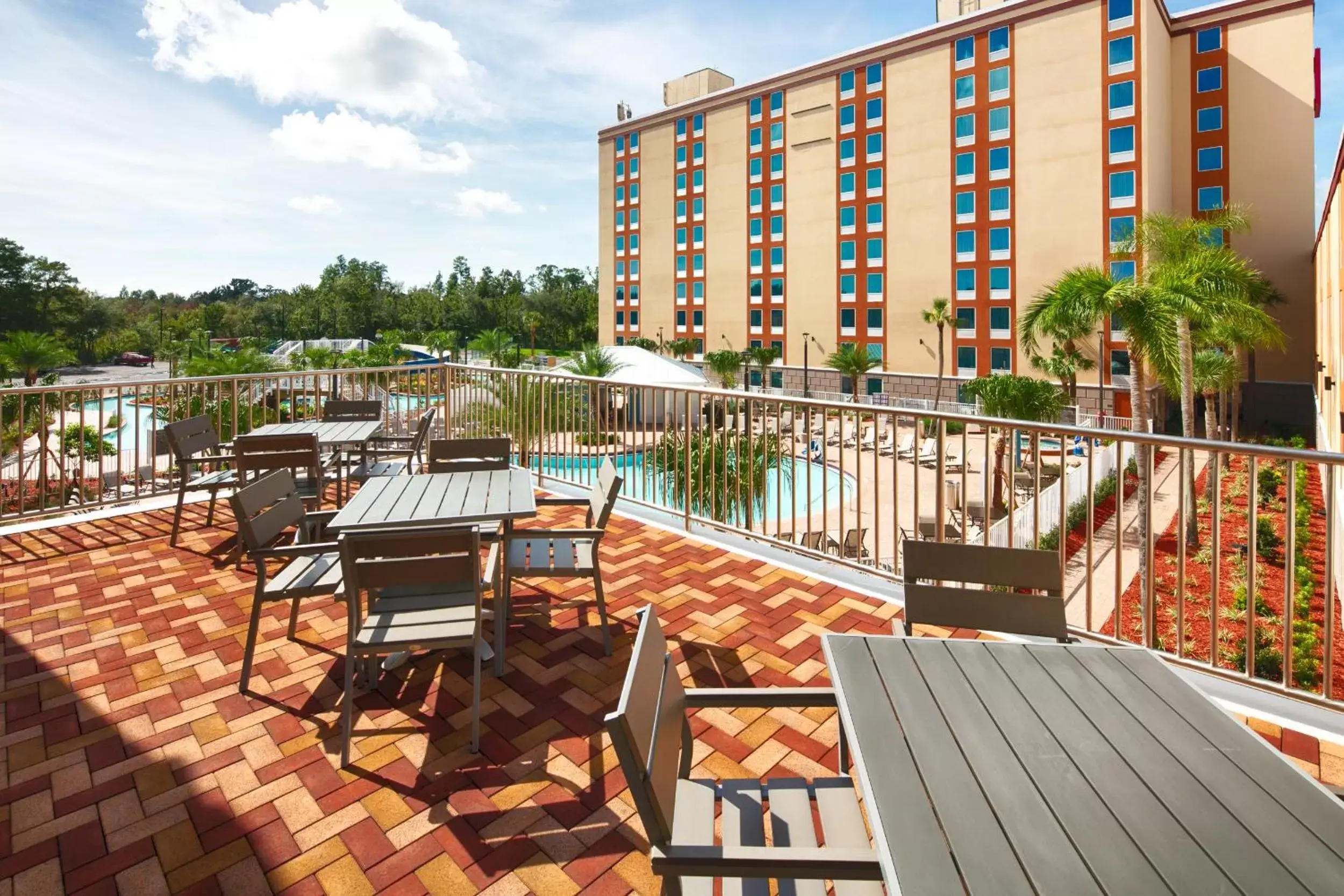 Balcony/Terrace, Swimming Pool in Red Lion Hotel Orlando Lake Buena Vista South- Near Disney